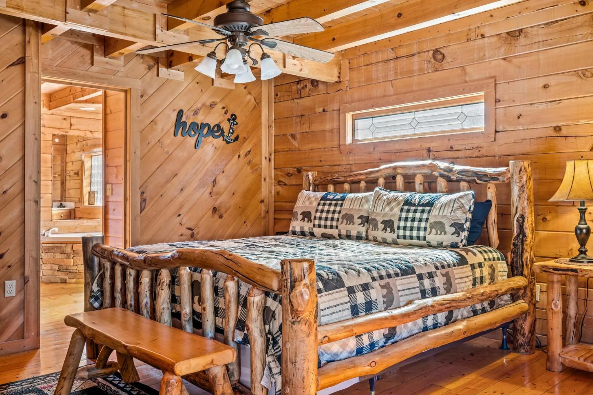 Bed in Bearfoot Pines - True Log Cabin - Wi-Fi, Hot Tub, Fishing, Deck with views! - Mins to PF
