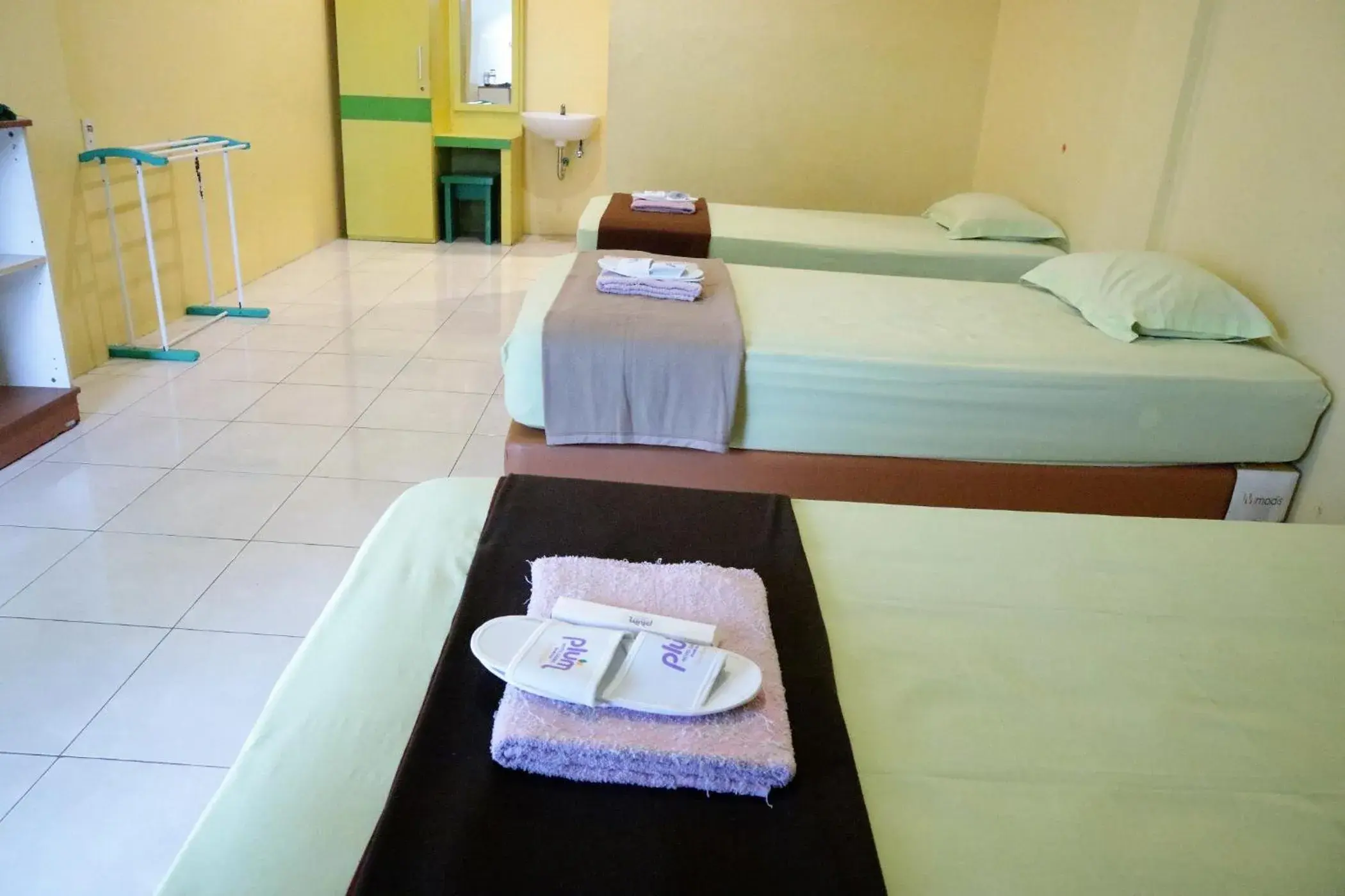 Standard Triple Room in Plum Hotel Lading Banda Aceh Standard Triple Room in Plum Hotel Lading Banda Aceh