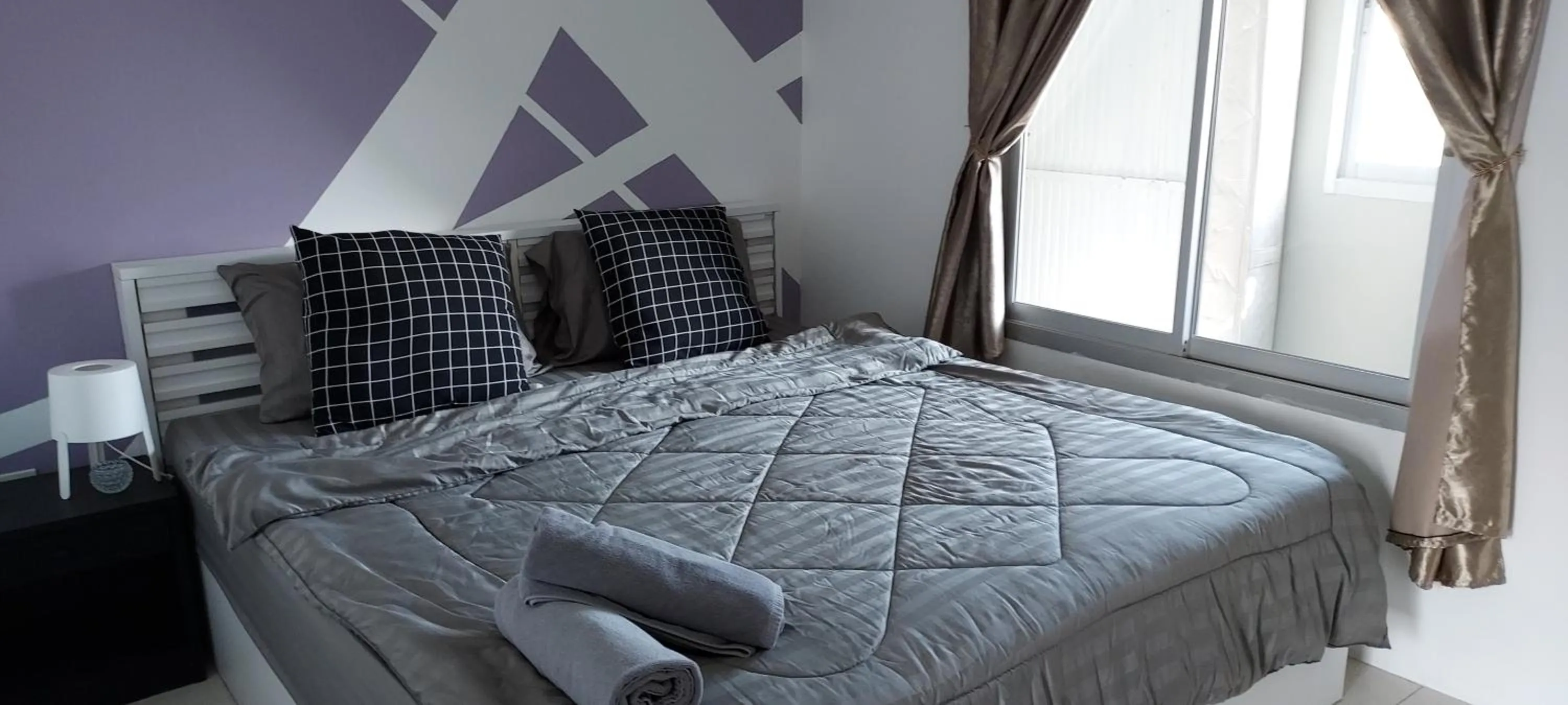 Bed in Hua Hin Paradise Guesthouse