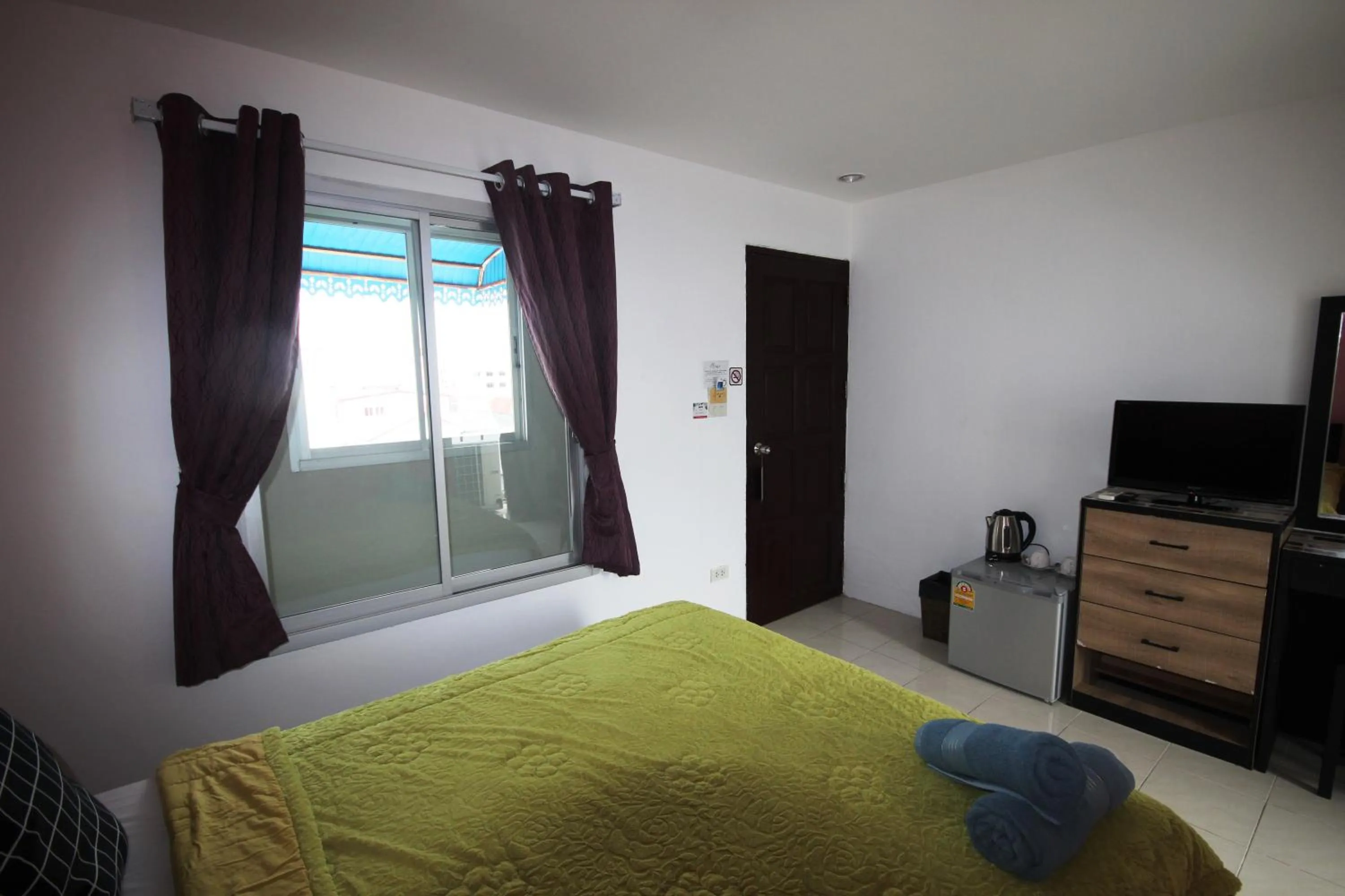 Bed in Hua Hin Paradise Guesthouse