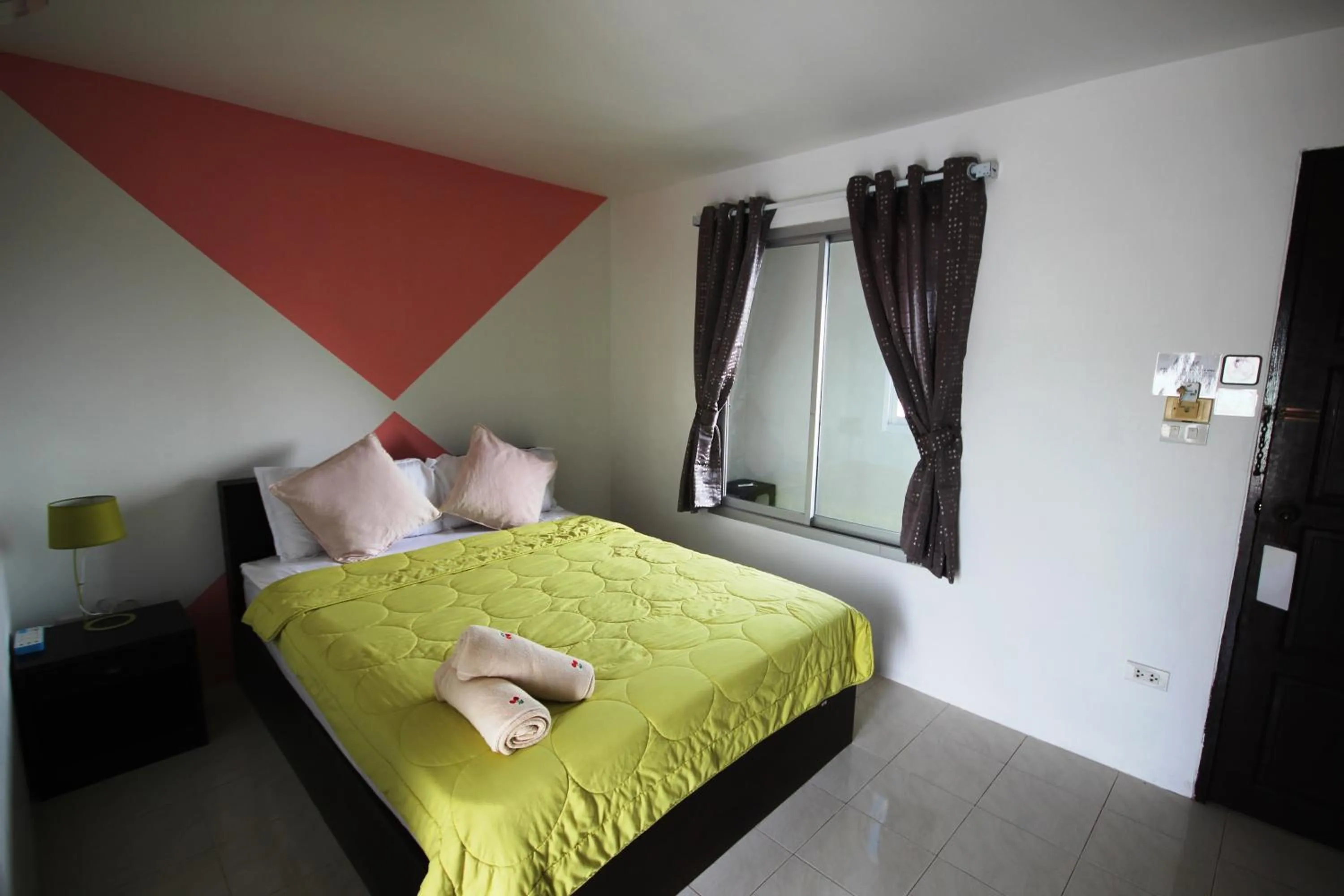 Bed in Hua Hin Paradise Guesthouse