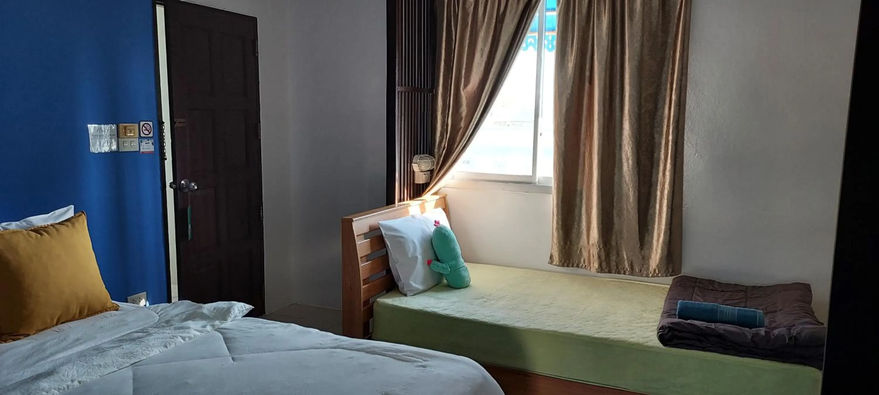 Bed in Hua Hin Paradise Guesthouse