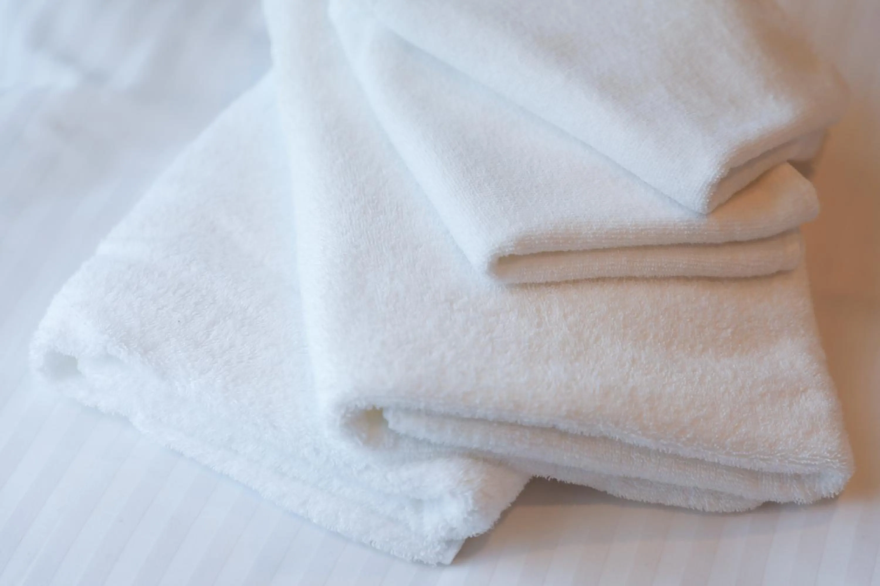 towels, Bed in HOTEL SO SUMIYOSHi ホテルソウ博多住吉