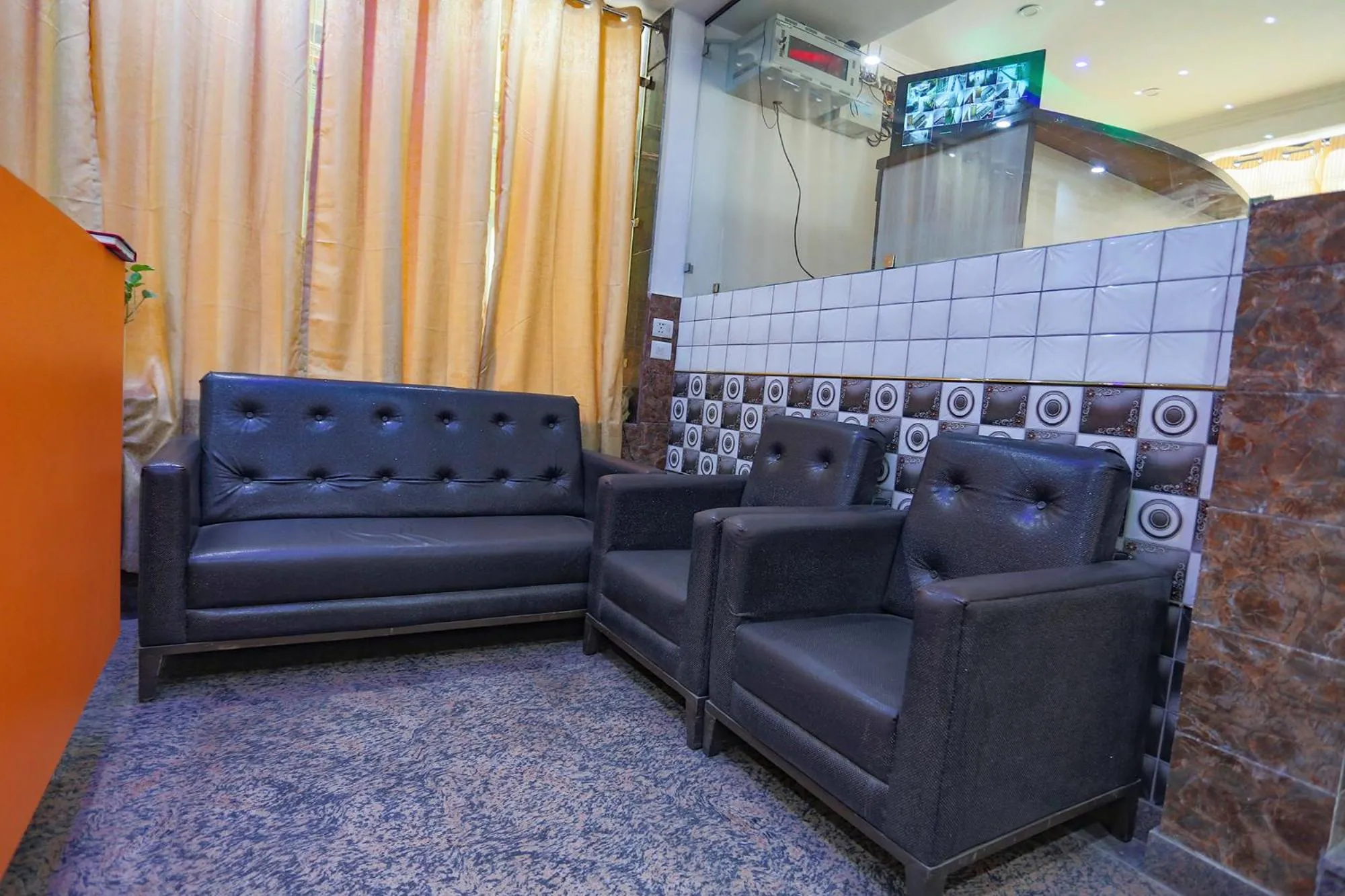 Seating area in FabHotel Gross inn Suites - Nr IGI Airport New Delhi