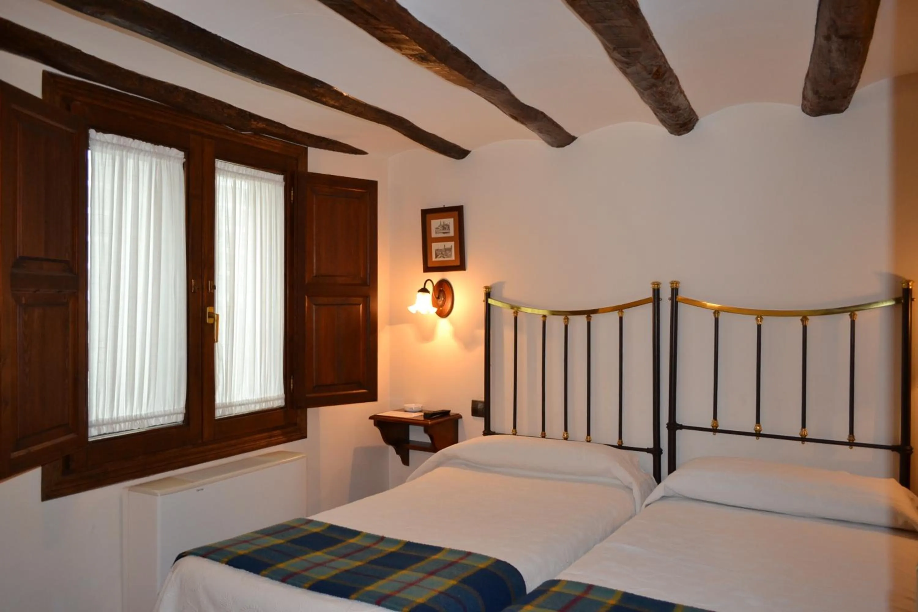 Photo of the whole room, Bed in Hostal Santa Agueda