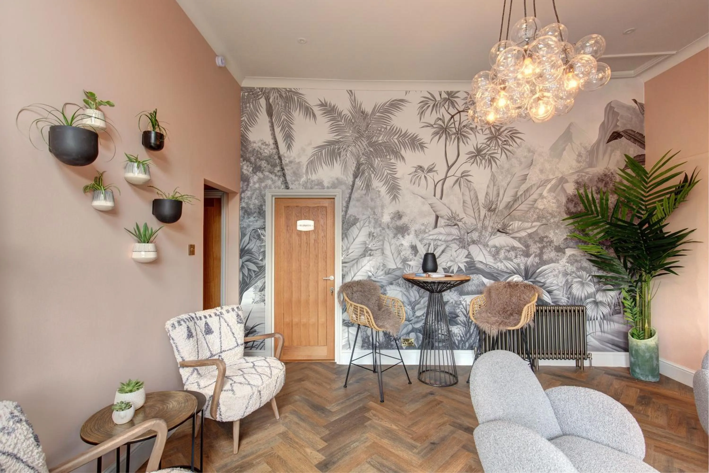 Communal lounge/ TV room in The Railway Hotel by Barefoot Retreats