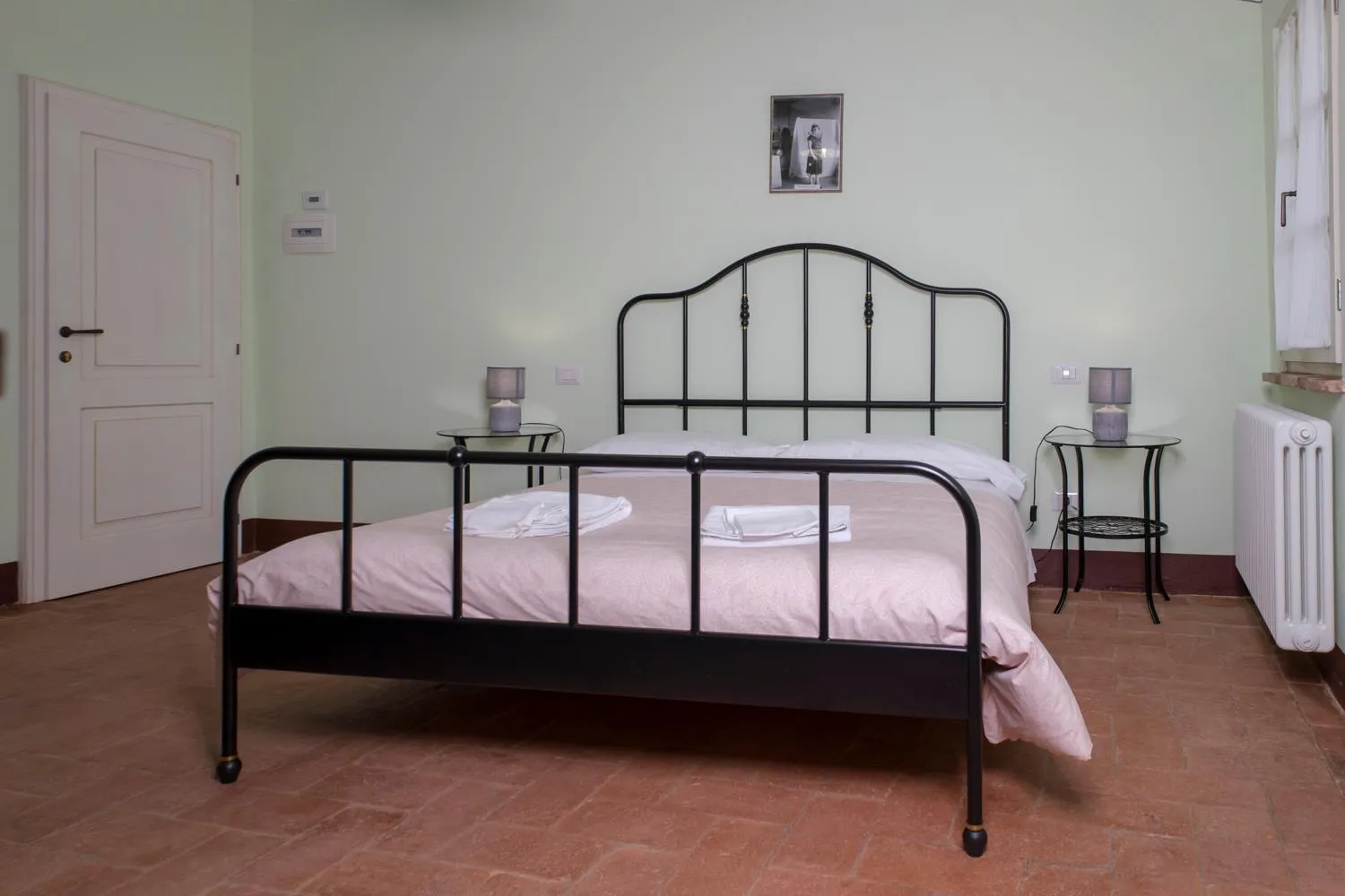 Photo of the whole room, Bed in In Collegiata