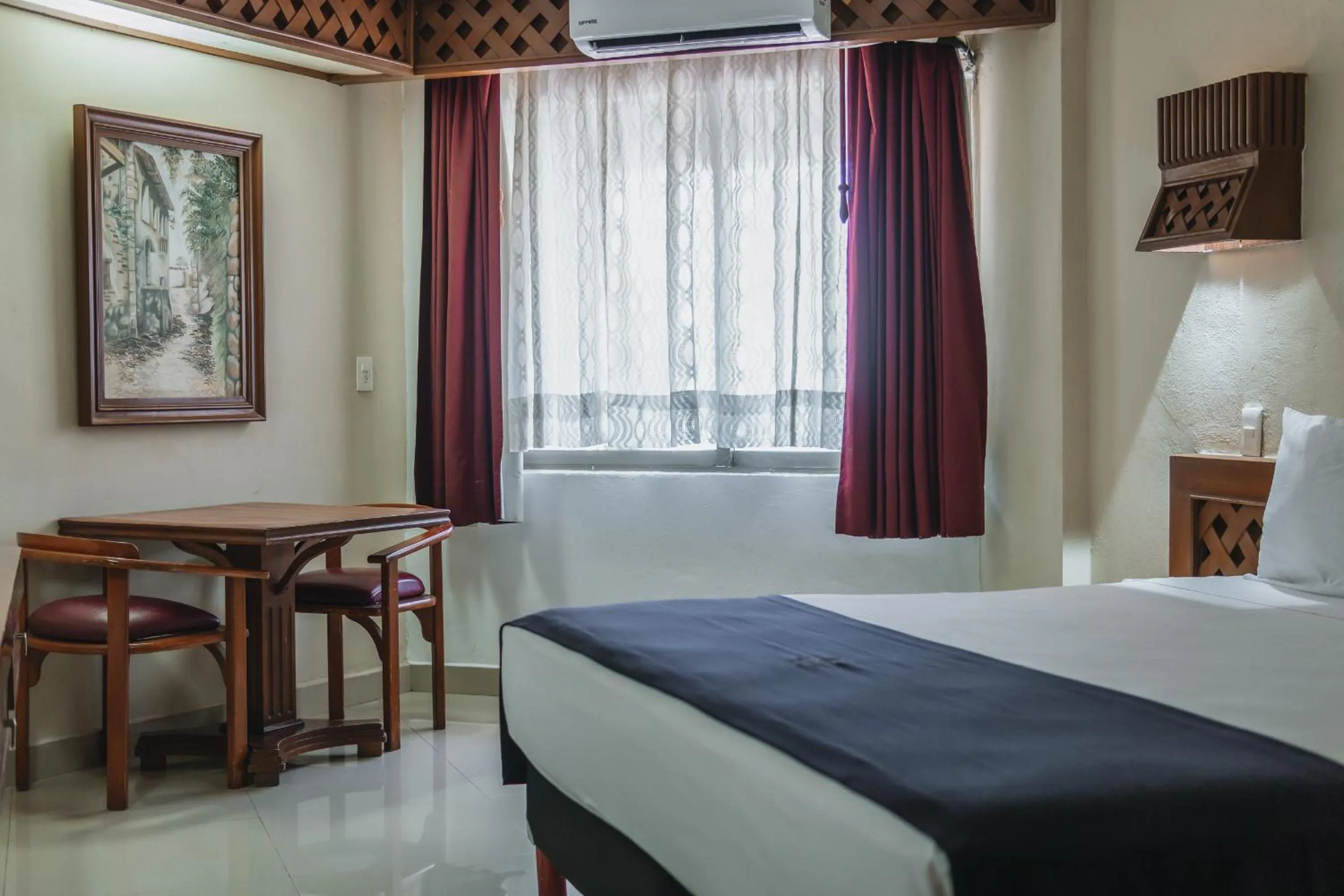 Bed in Hotel Plaza Kokai Cancún