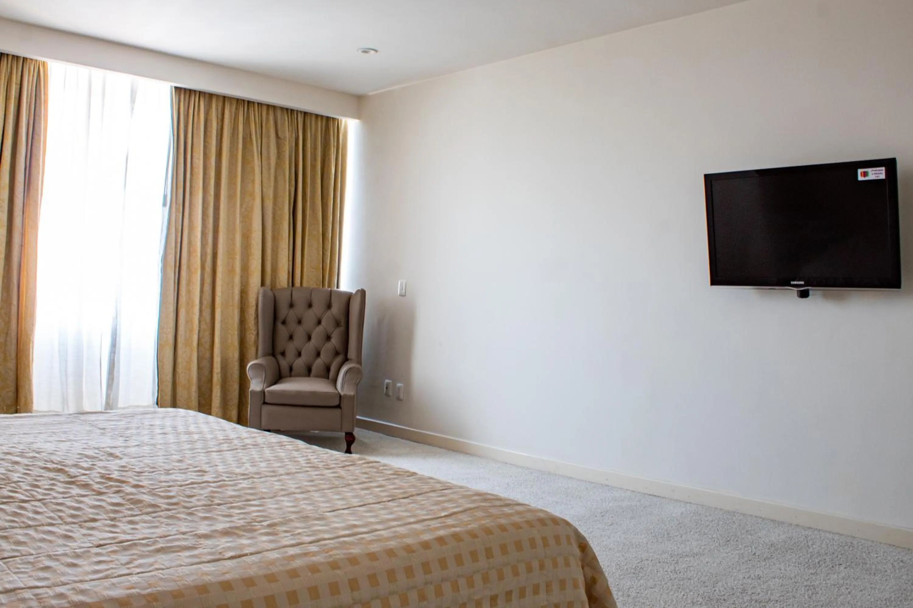 Photo of the whole room in Mision Guadalajara Centro Historico