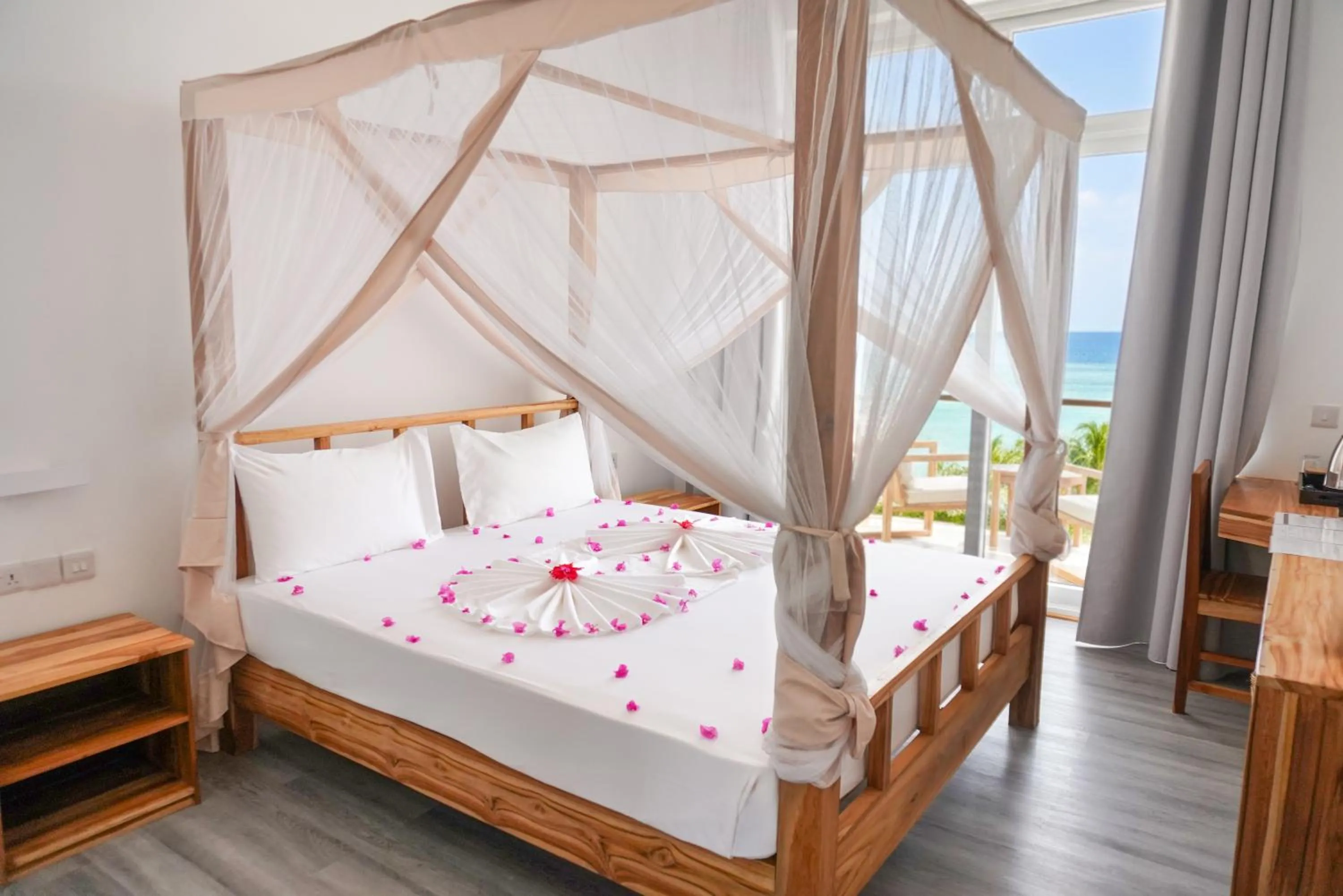 Bed in AHG Sun Bay Mlilile Beach Hotel