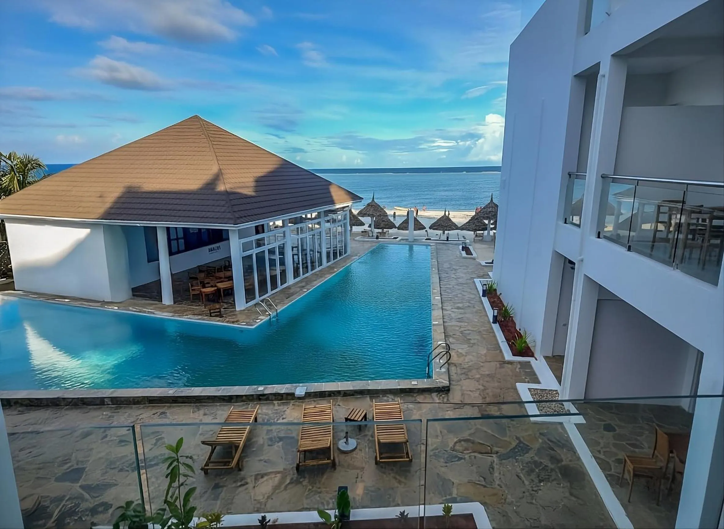 Bed in AHG Sun Bay Mlilile Beach Hotel