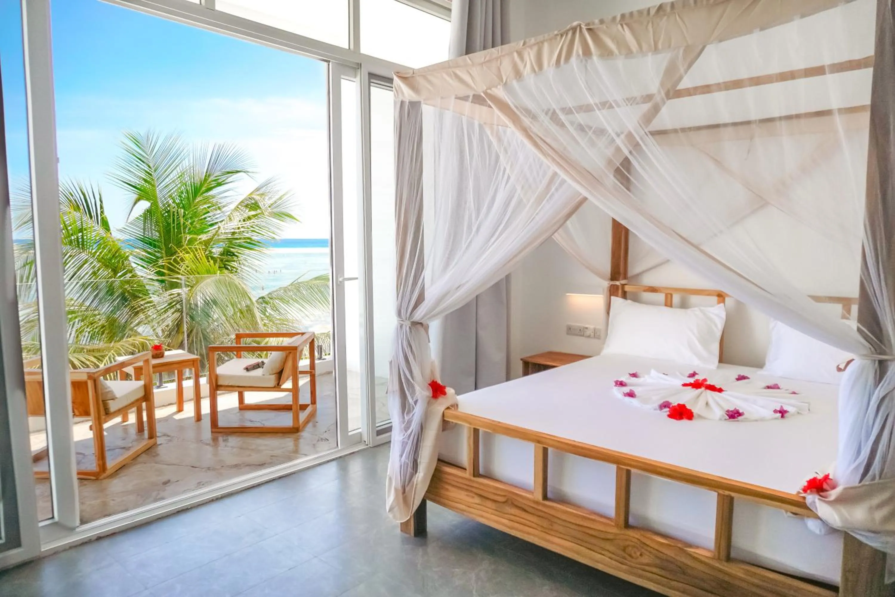 Bed in AHG Sun Bay Mlilile Beach Hotel