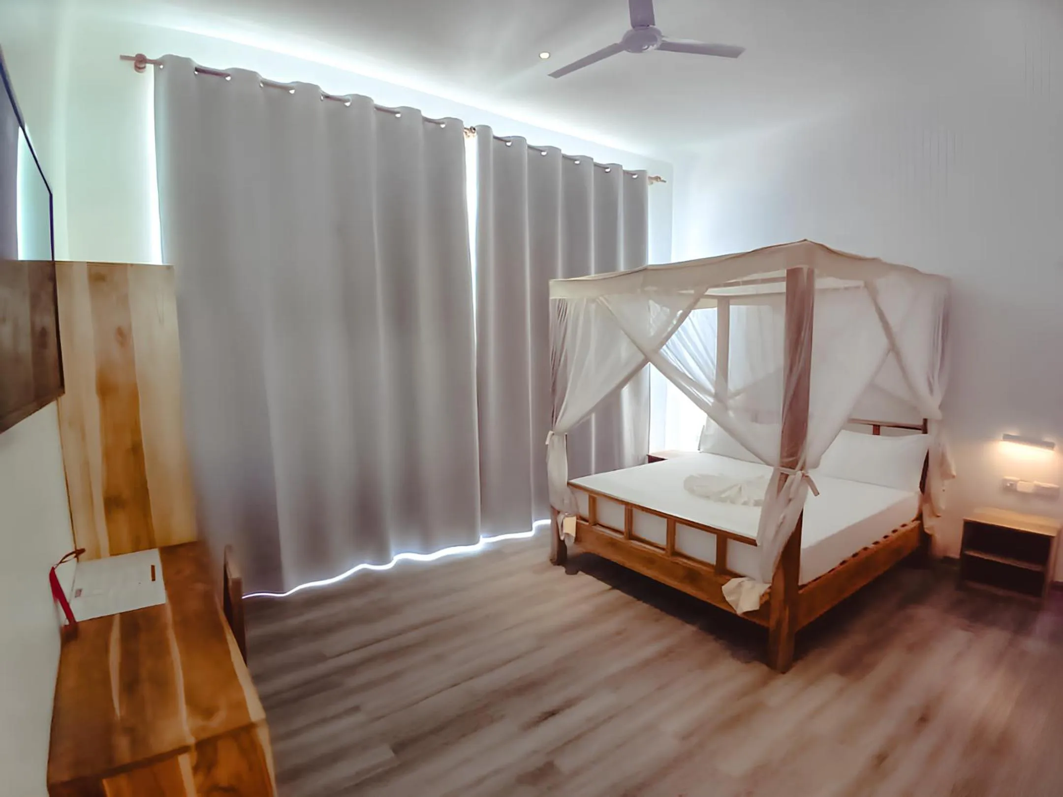 Bed in AHG Sun Bay Mlilile Beach Hotel