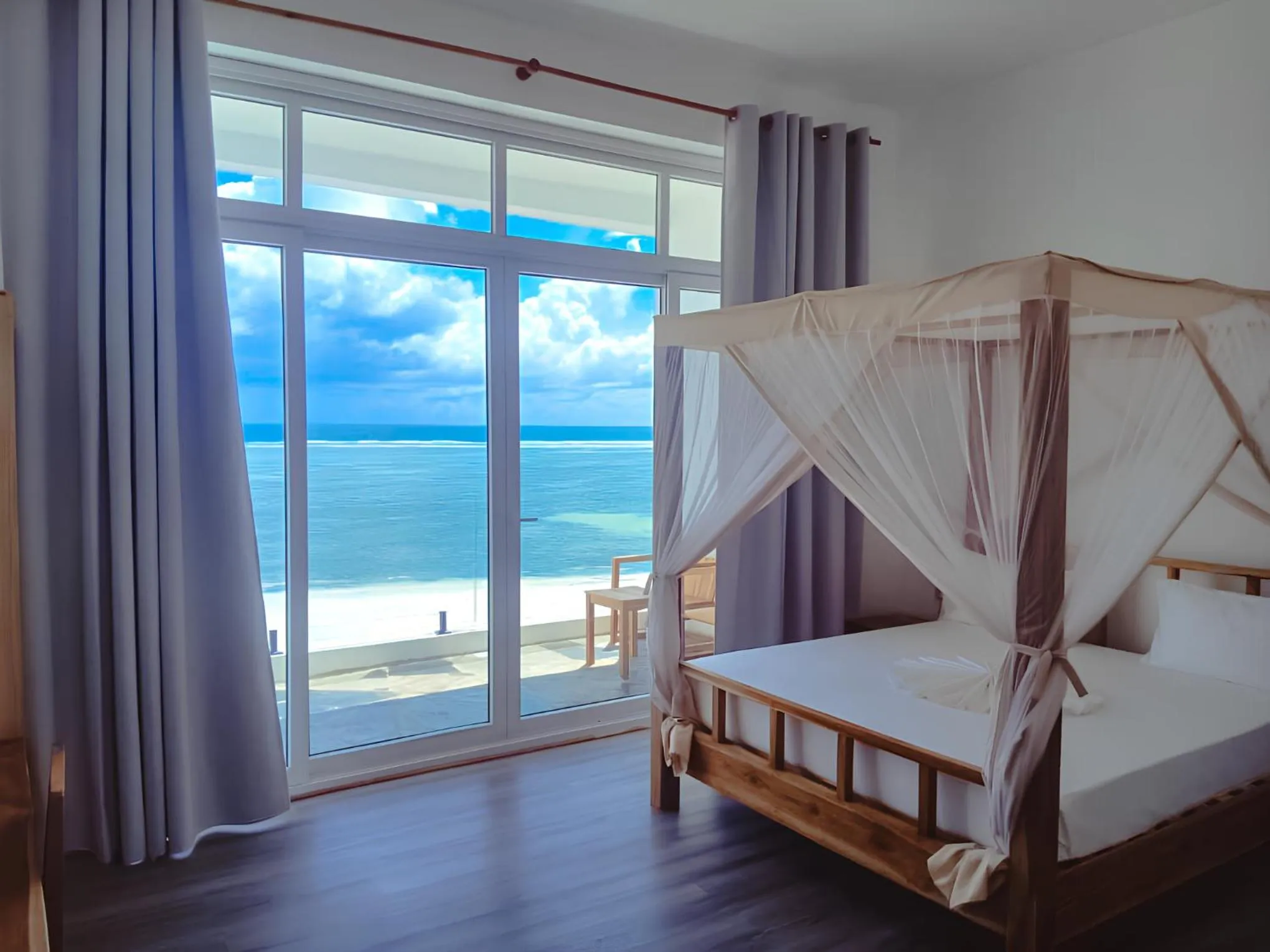 Bed in AHG Sun Bay Mlilile Beach Hotel