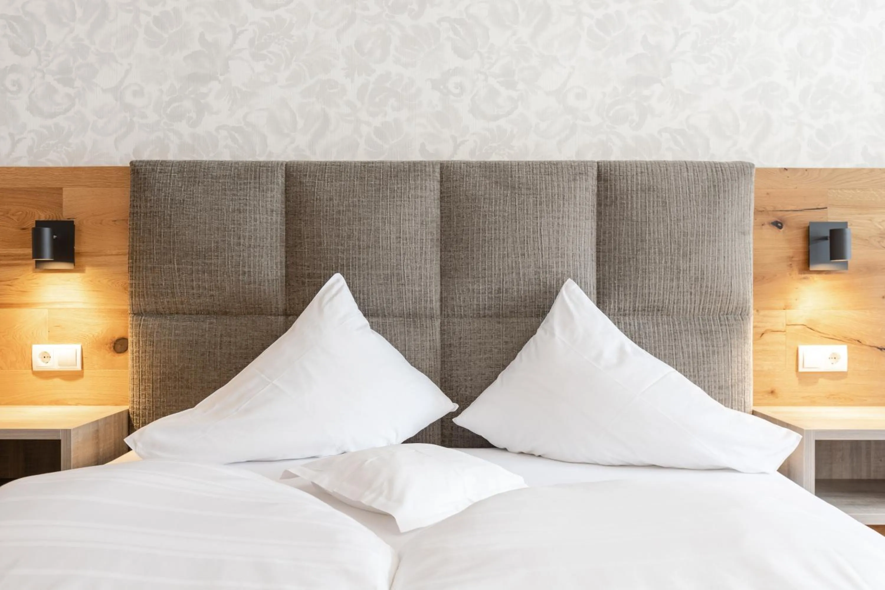 Photo of the whole room, Bed in Vitalpina Hotel Magdalenahof