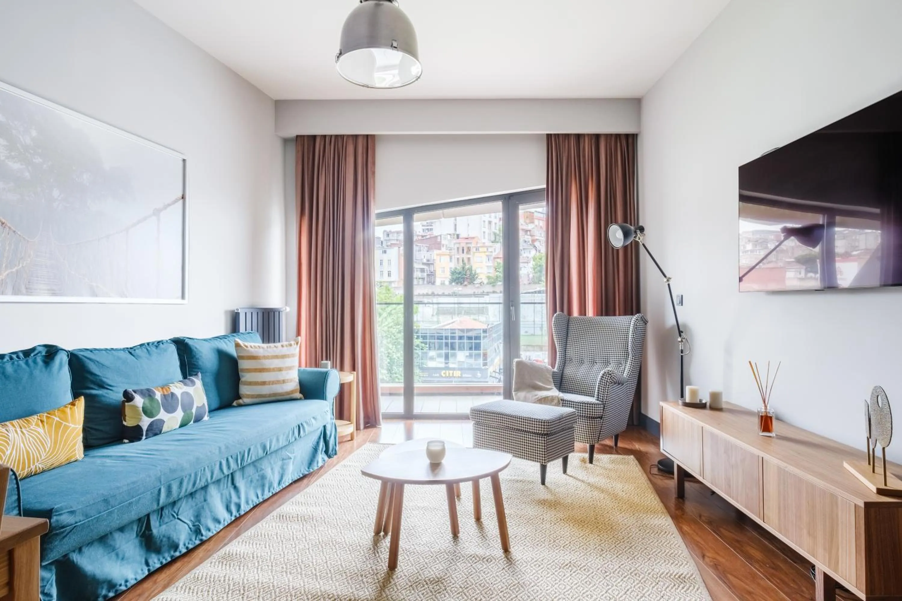 TV and multimedia in Benesta Residence by NewInn