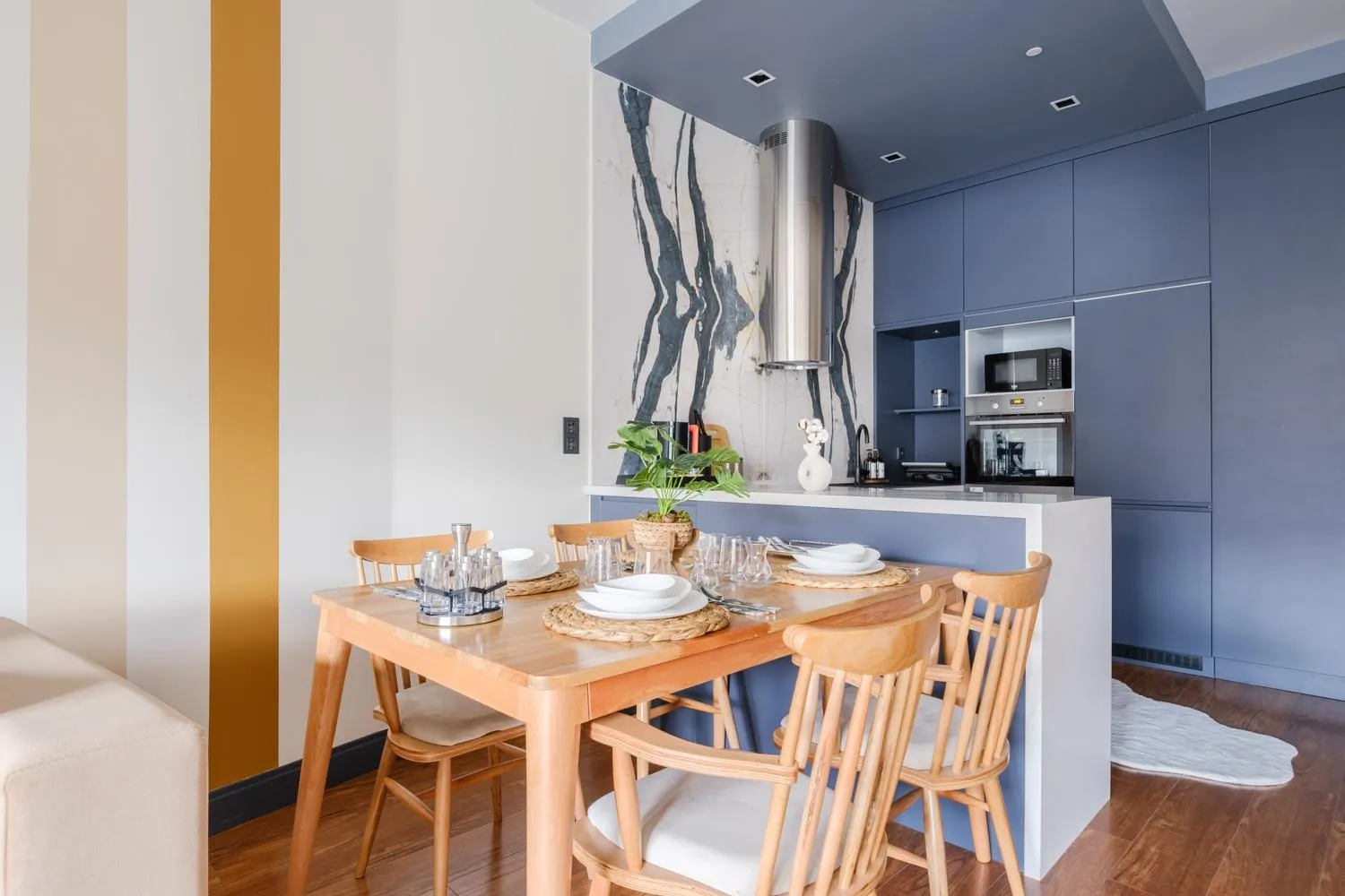 Dining area in Benesta Residence by NewInn