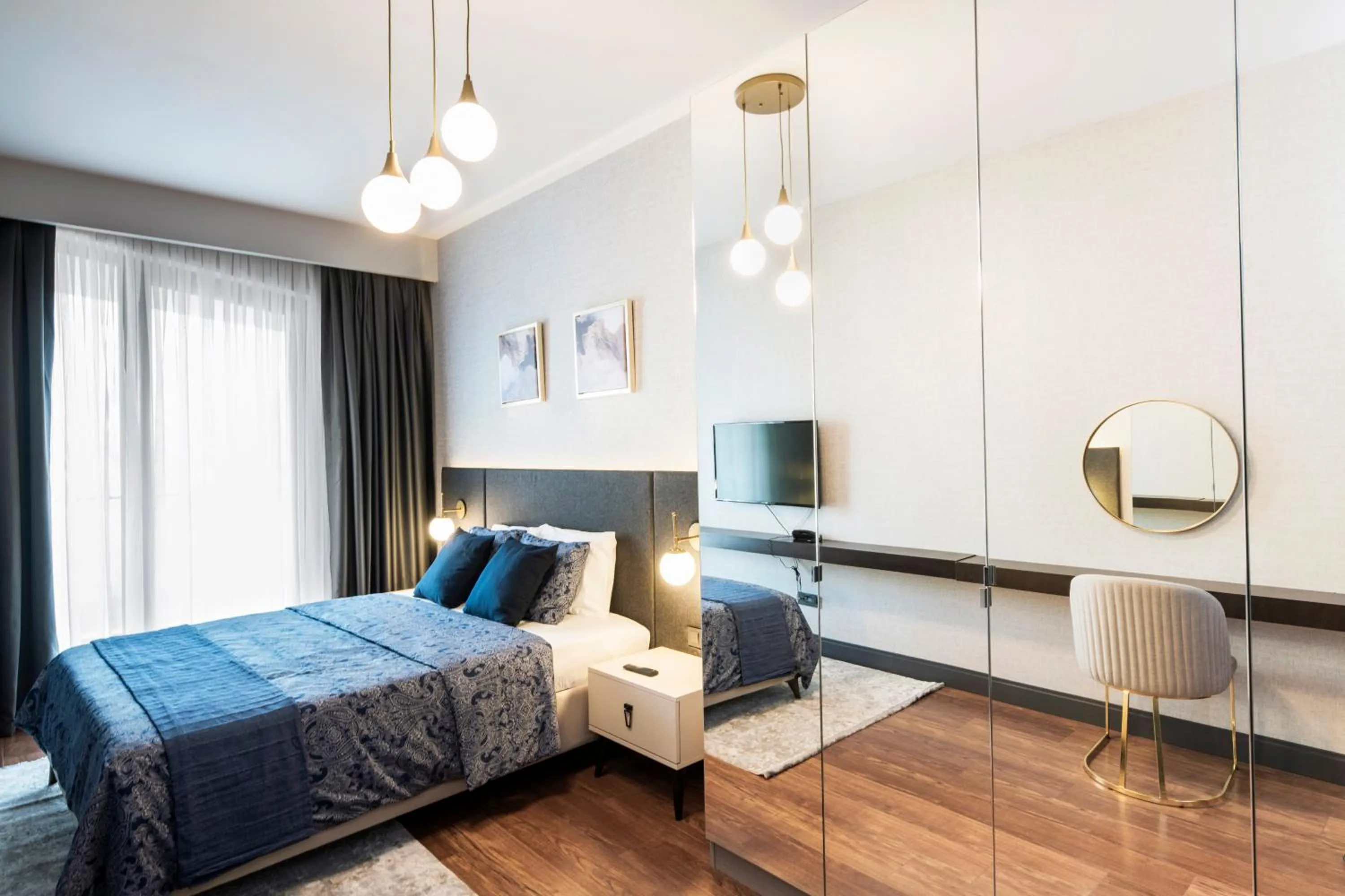 Photo of the whole room, Bed in Benesta Residence by NewInn