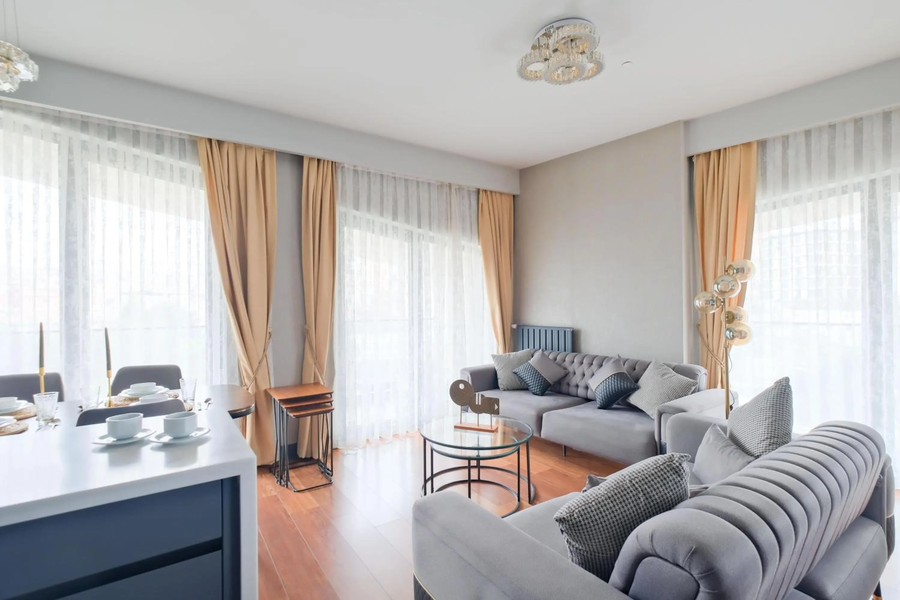 Living room in Benesta Residence by NewInn