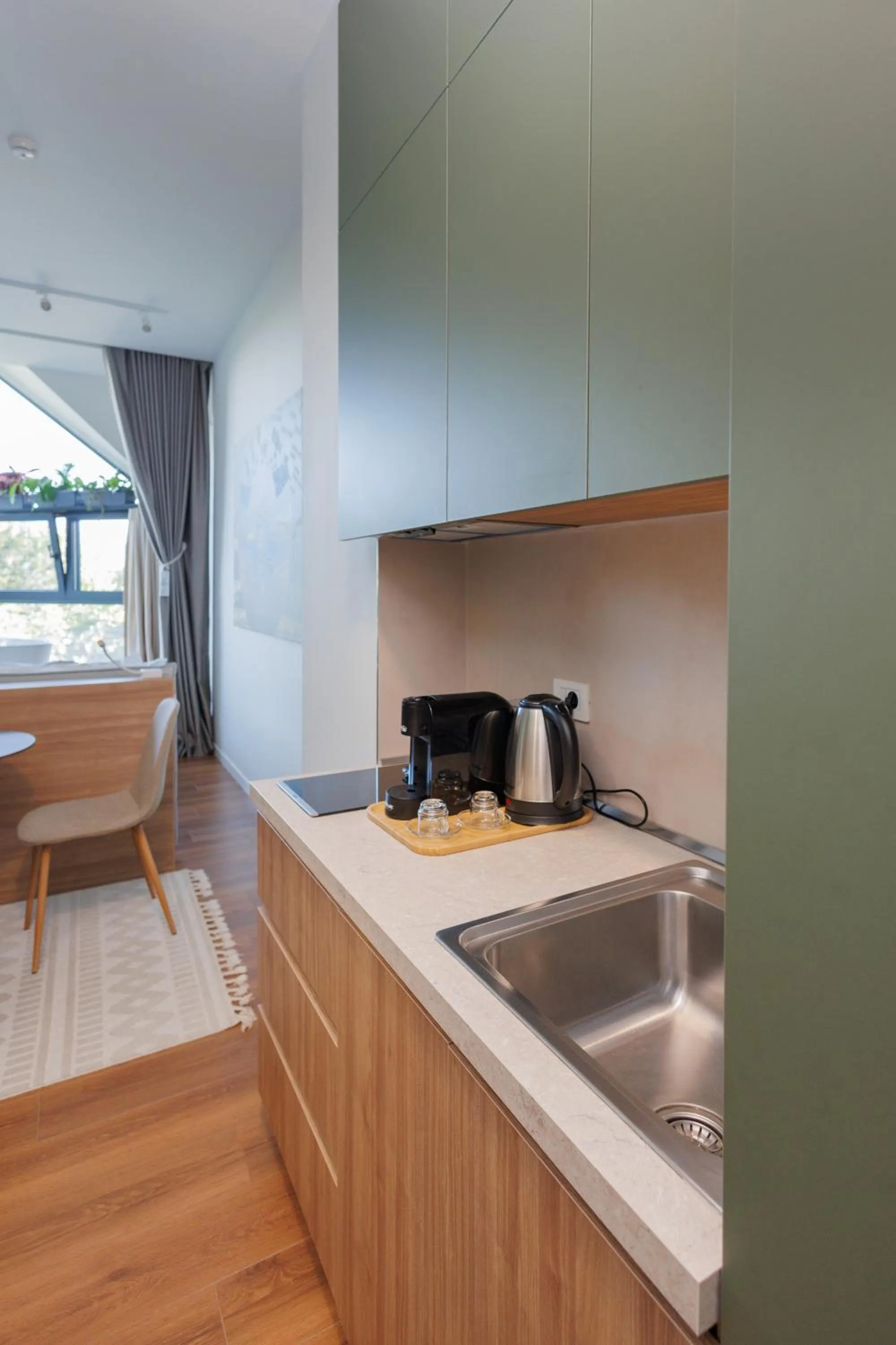 Kitchen or kitchenette in Retreat Apartments