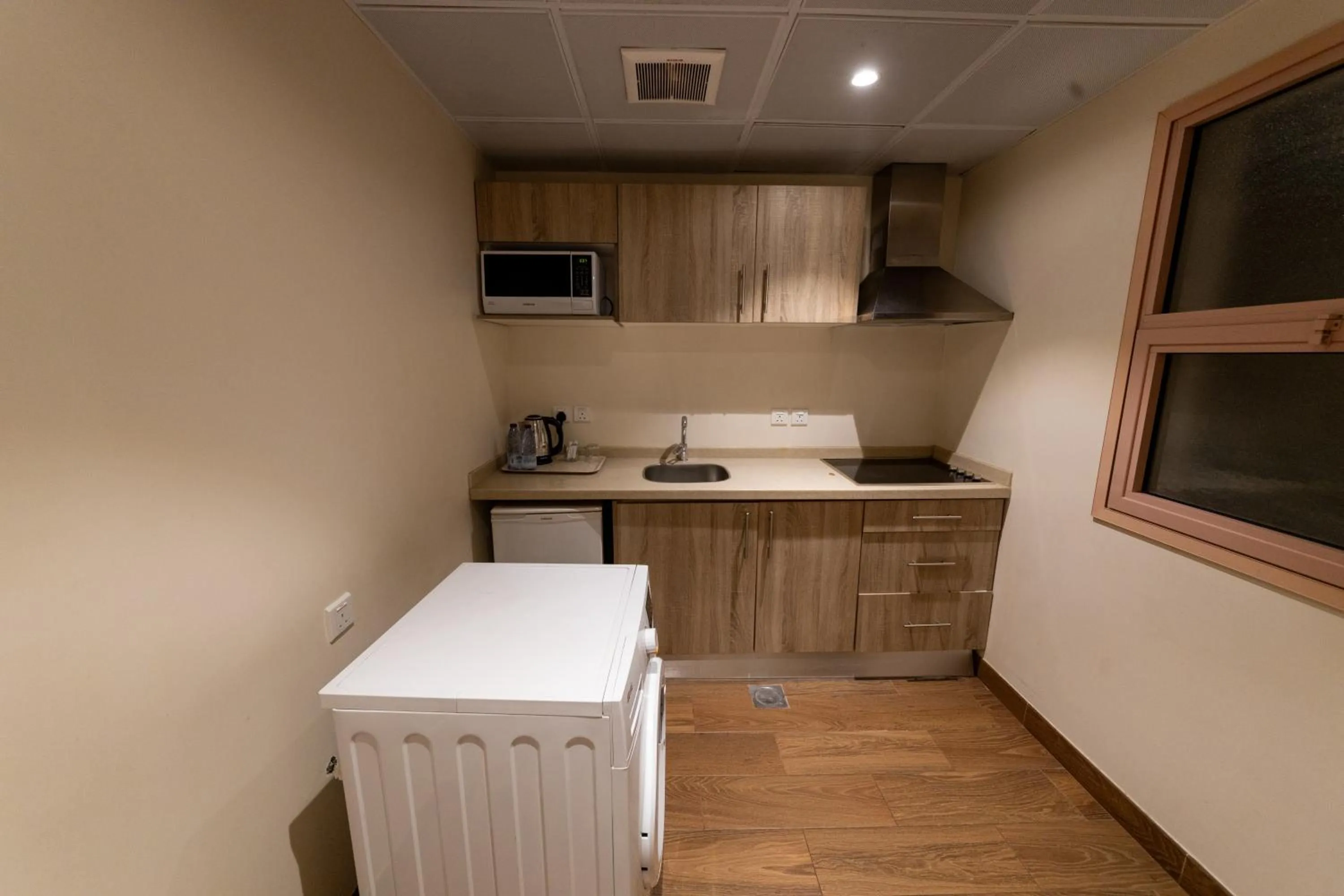 Kitchen or kitchenette in Burj Al Hayat Hotel Suites - Al Olaya