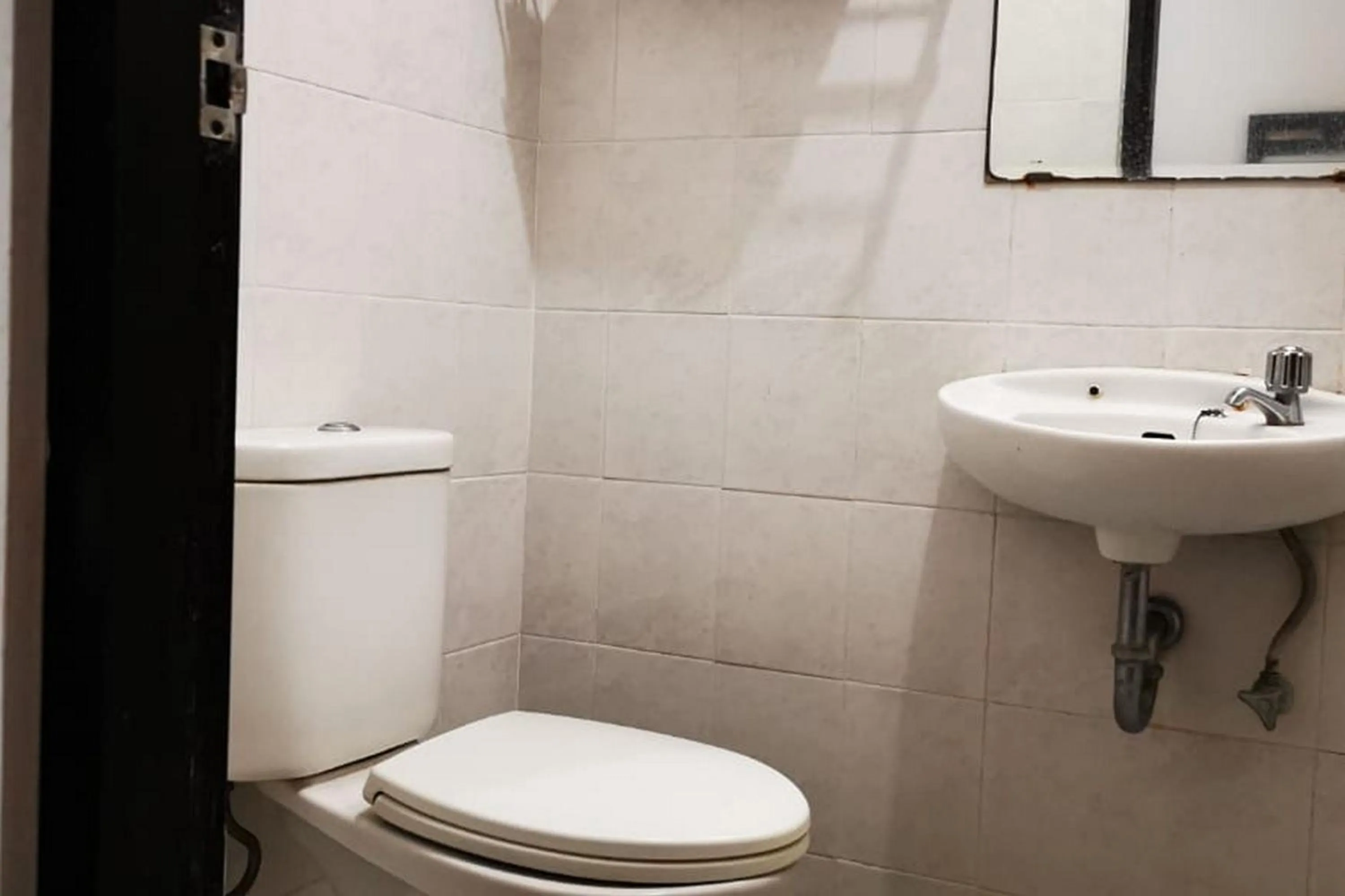 Bathroom in Dinnar Homestay Gayungan Syariah RedPartner