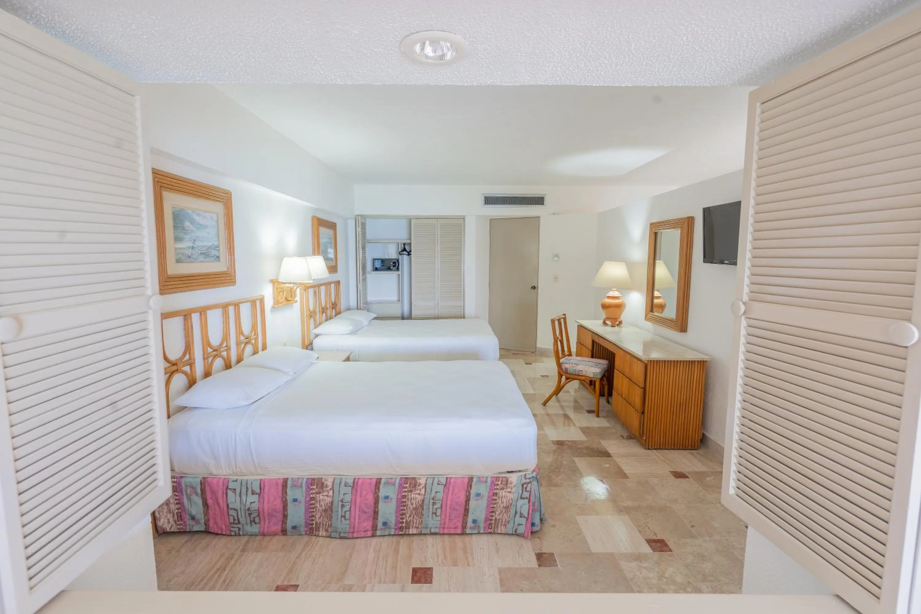 Bed in Playa Suites Acapulco