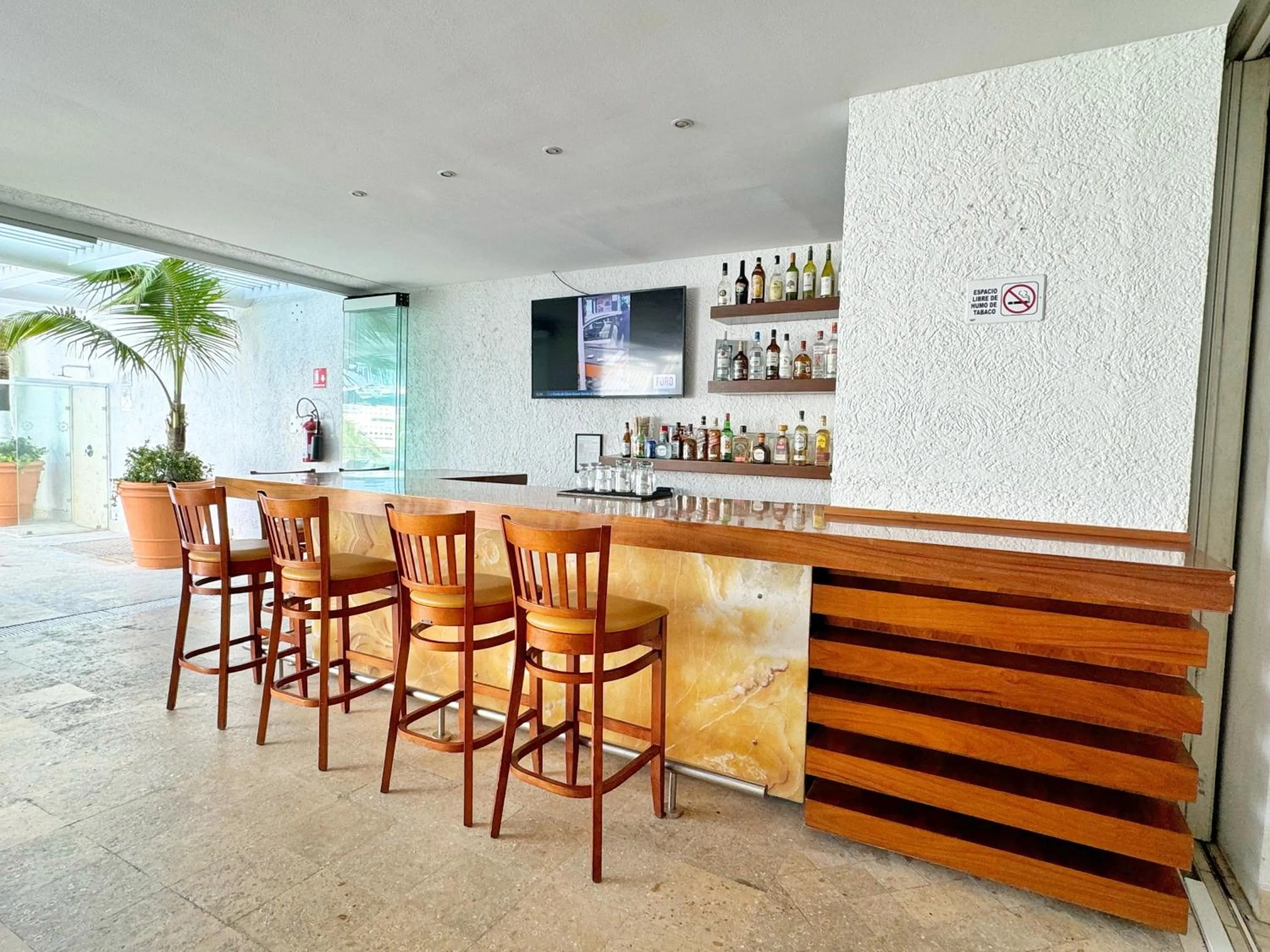 Lounge or bar in Hotel Casa Mexicana Cozumel