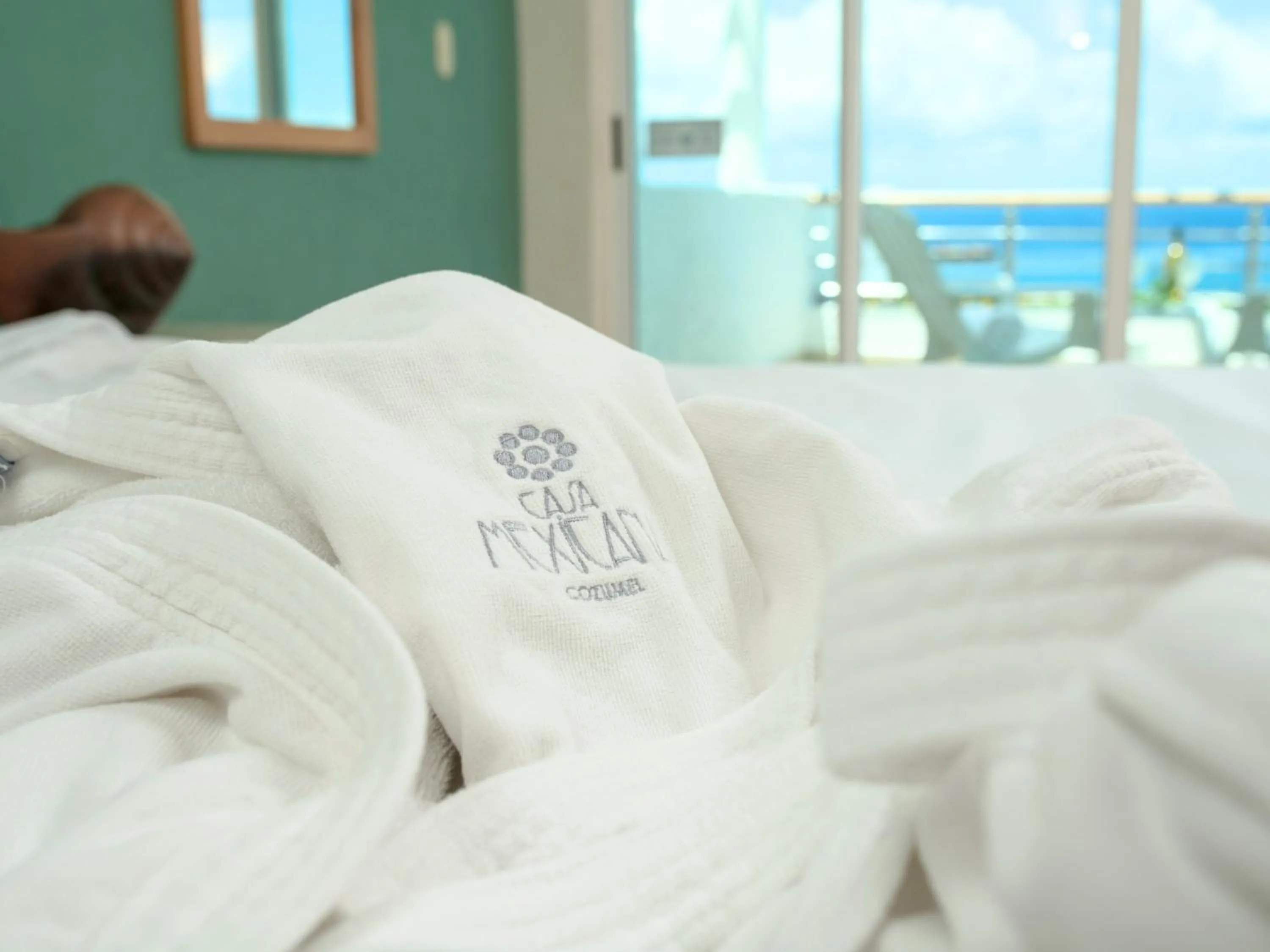 Bed in Hotel Casa Mexicana Cozumel