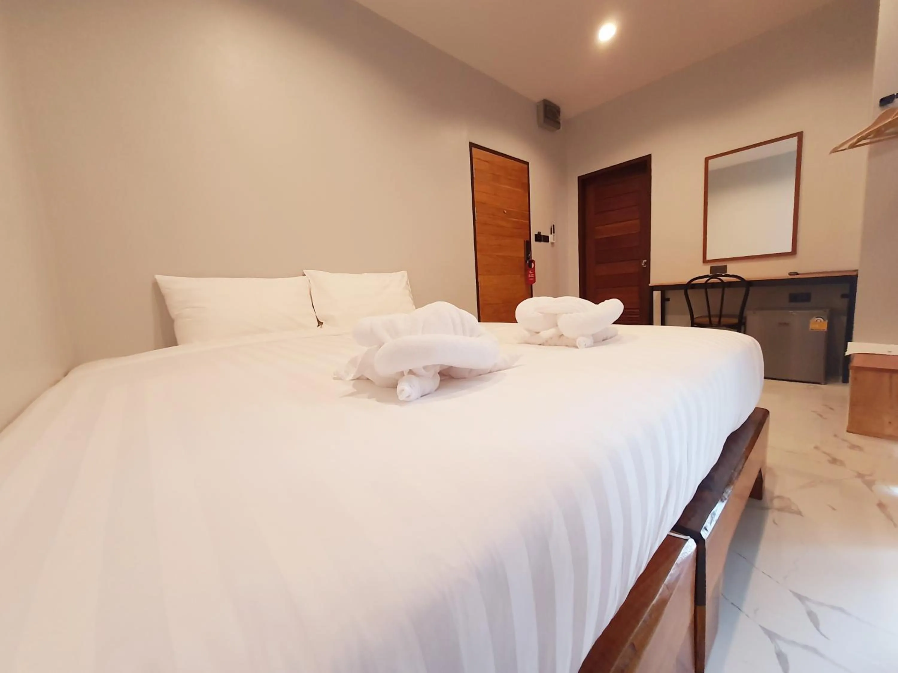 Bed in SUhotel Suratthani