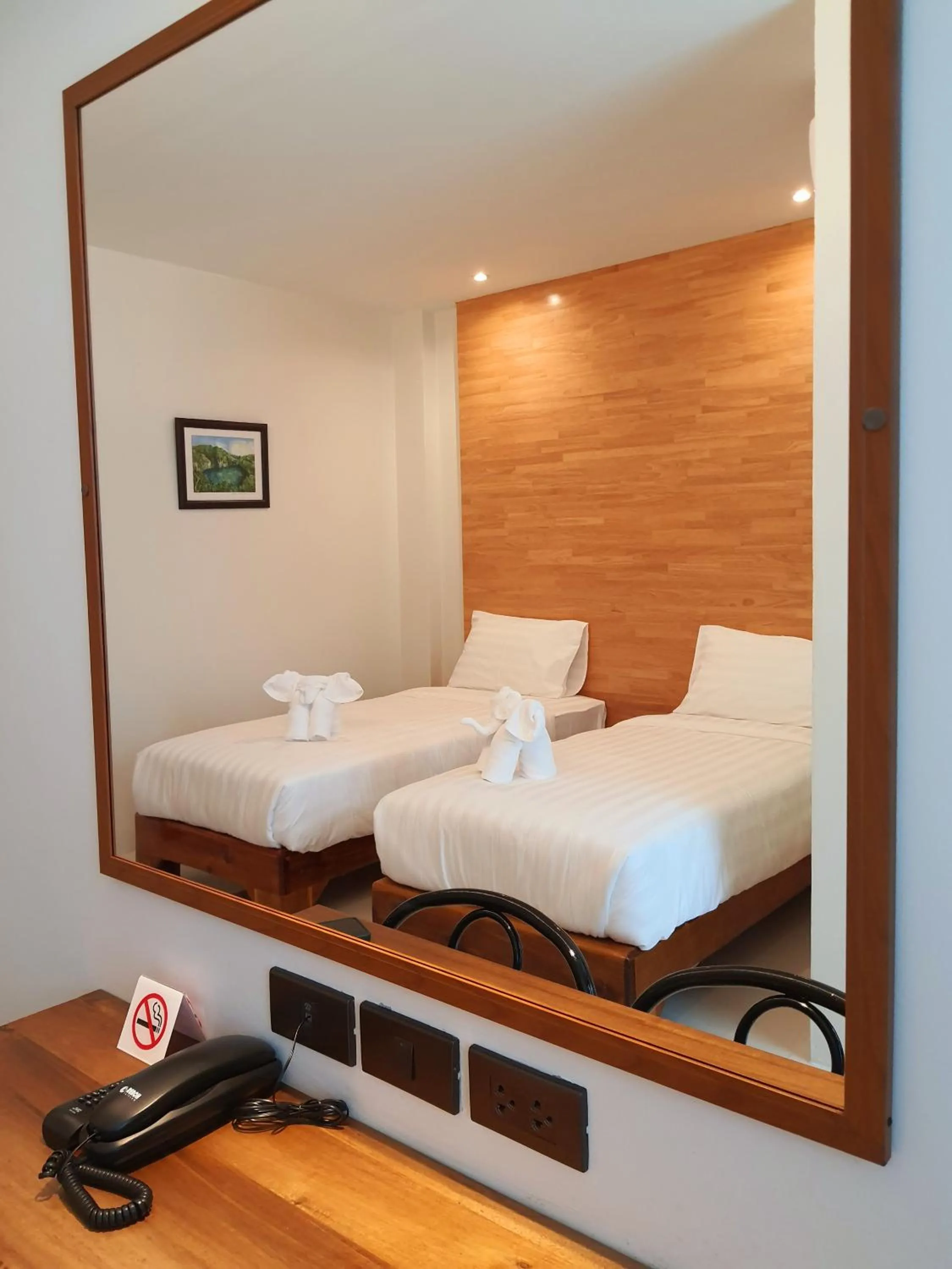 Photo of the whole room, Bed in SUhotel Suratthani