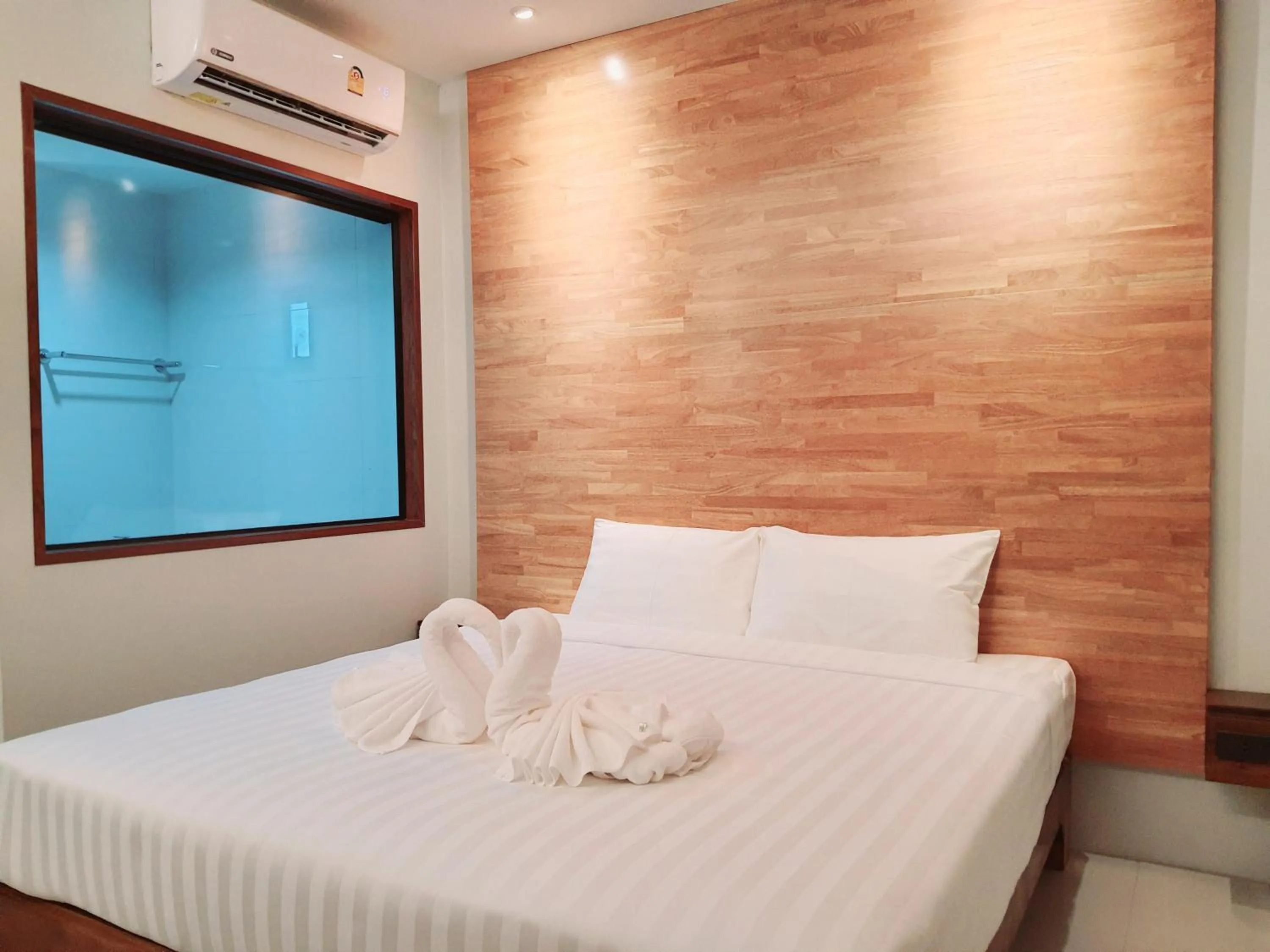 Bed in SUhotel Suratthani