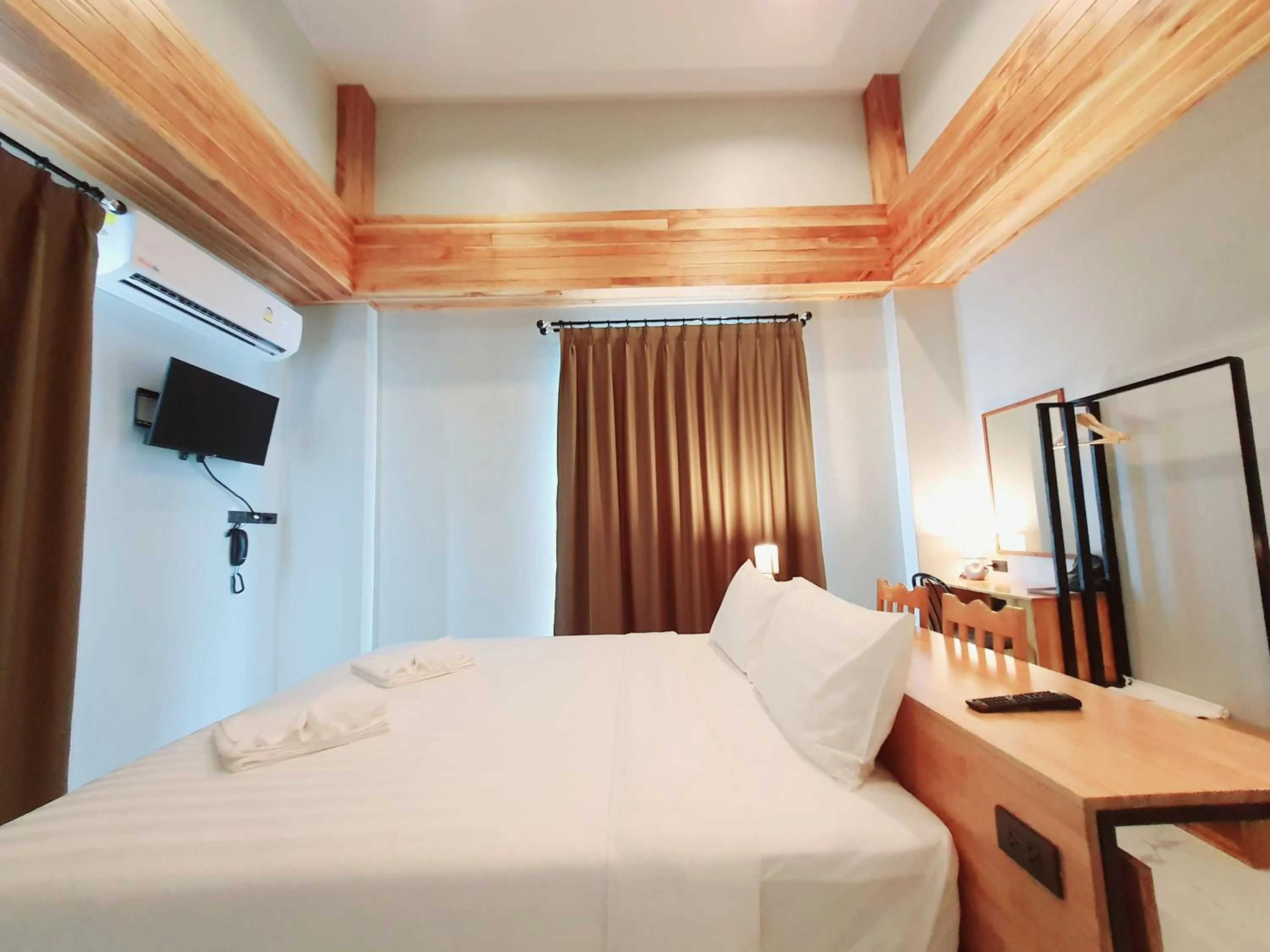 Bed in SUhotel Suratthani