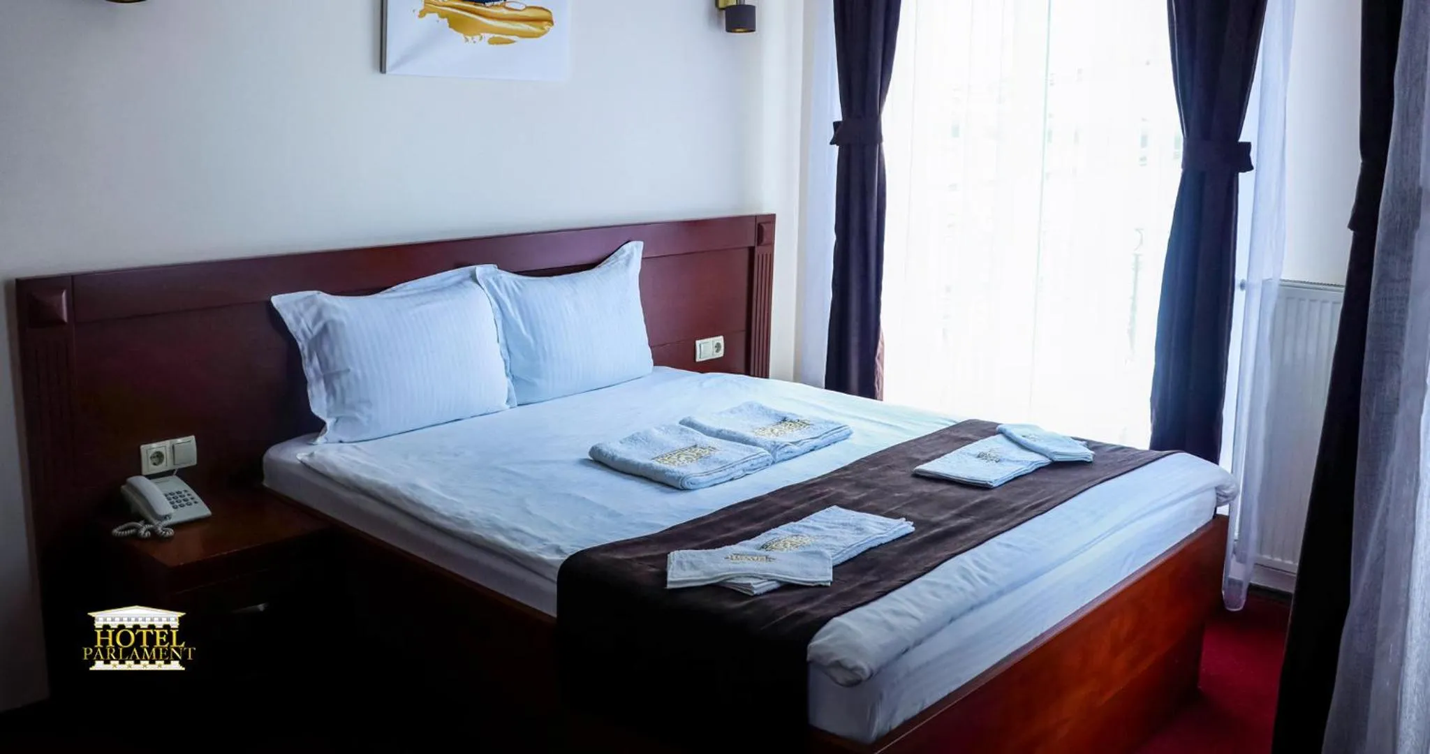 Bed in Hotel Parlament