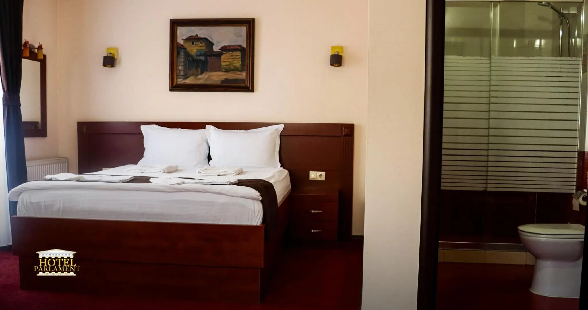 Toilet, Bed in Hotel Parlament