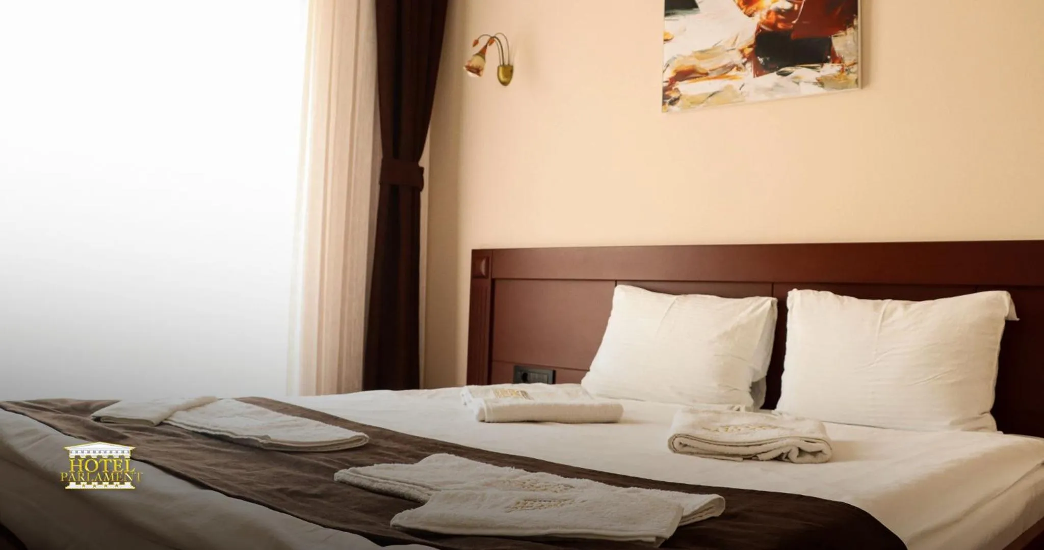 Bed in Hotel Parlament