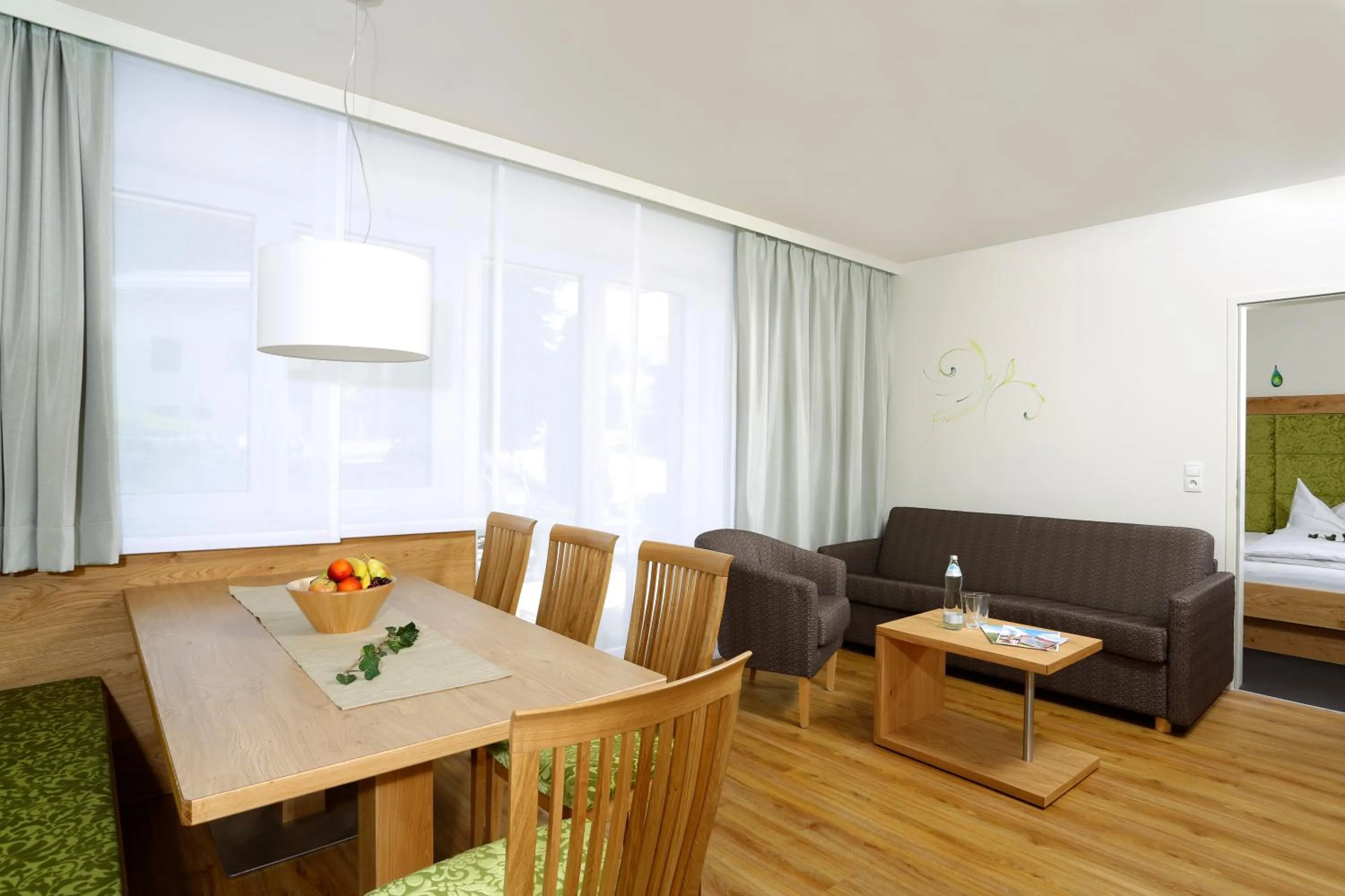 Living room in Aparthotel Rubinius