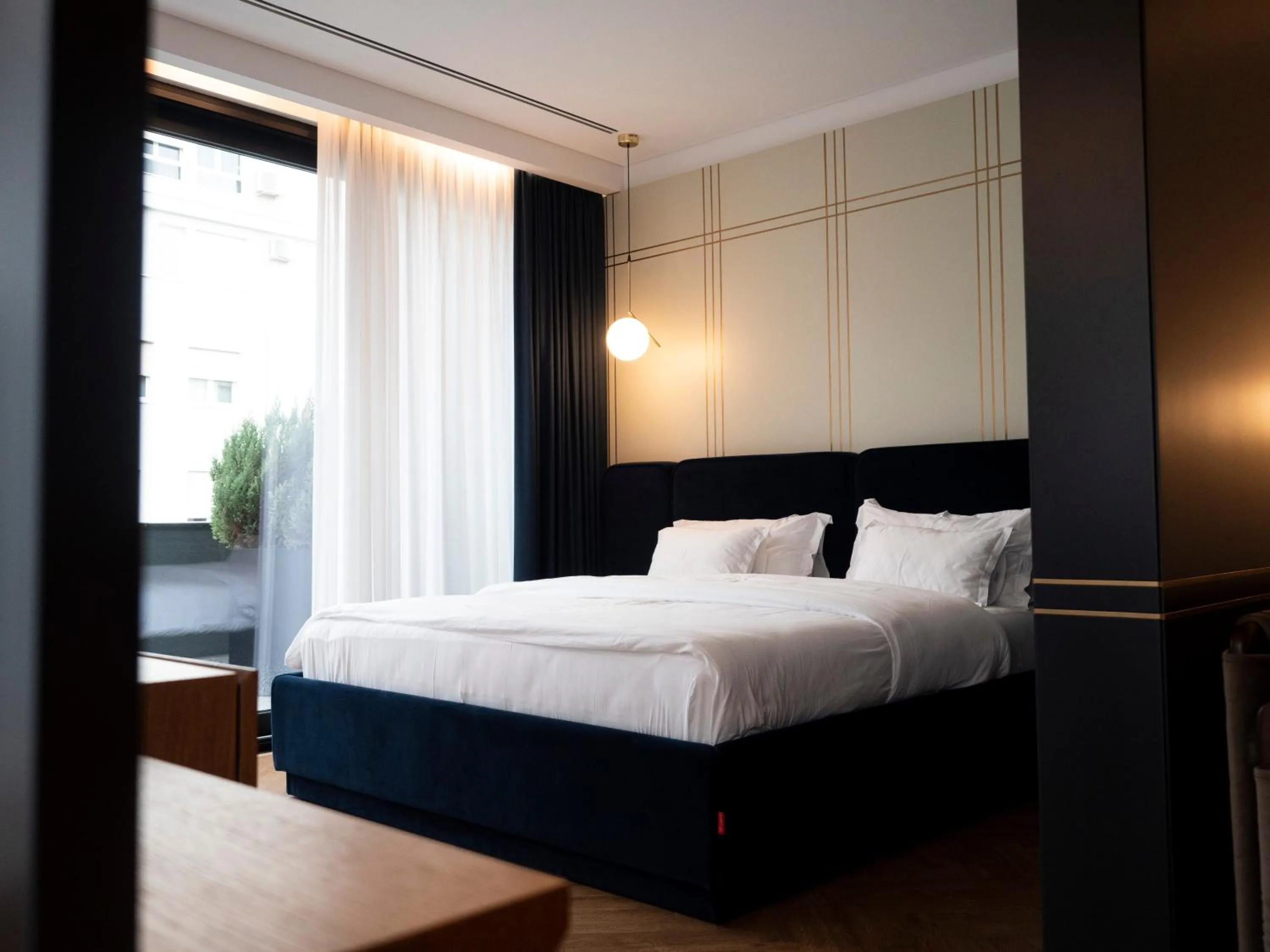 Bed in Moncafe Boutique Hotel & SPA Tirana