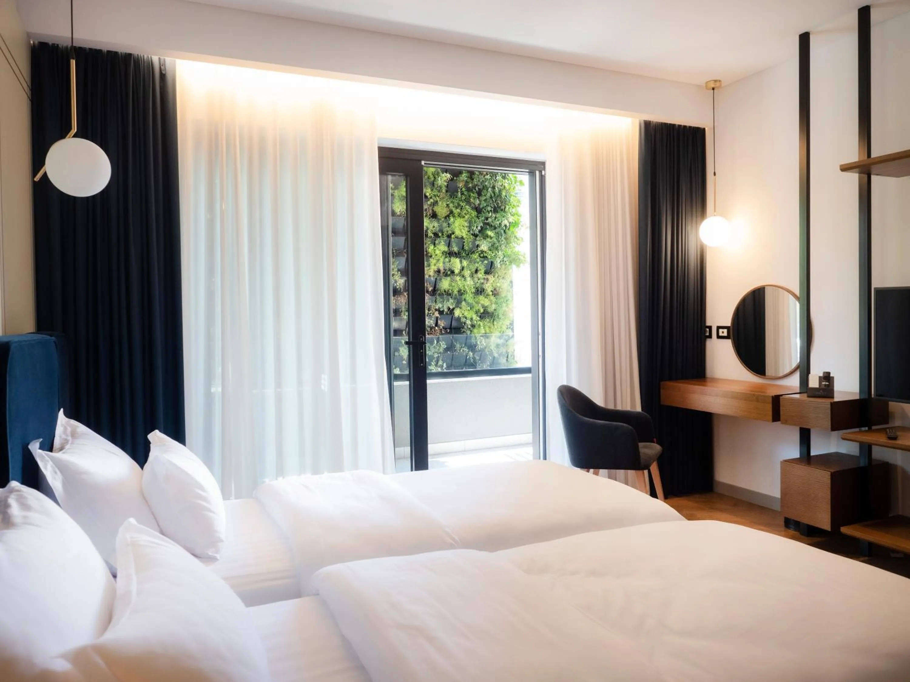 Bed in Moncafe Boutique Hotel & SPA Tirana