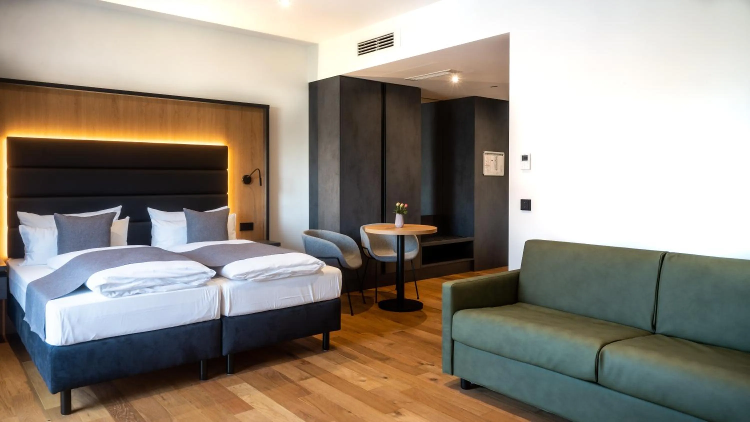 Photo of the whole room, Bed in Burgau Hotel Sonnenhof