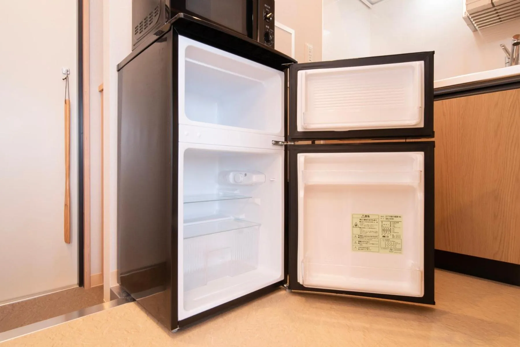 Kitchen or kitchenette in WELLSTAY Shinsekai Wakyo