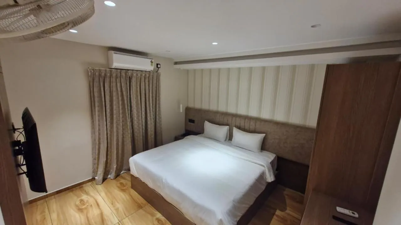 Bed in Muziris Manor Residency
