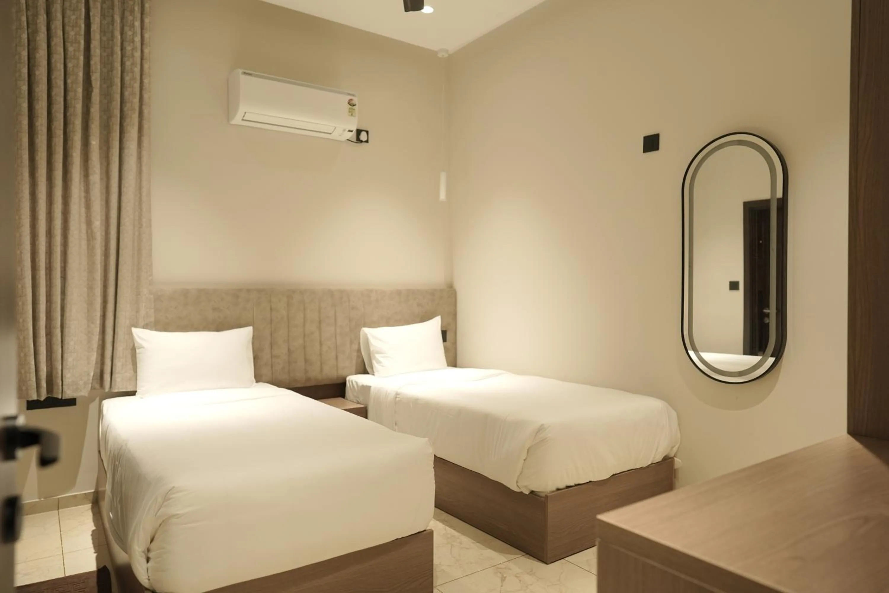 Bed in Muziris Manor Residency