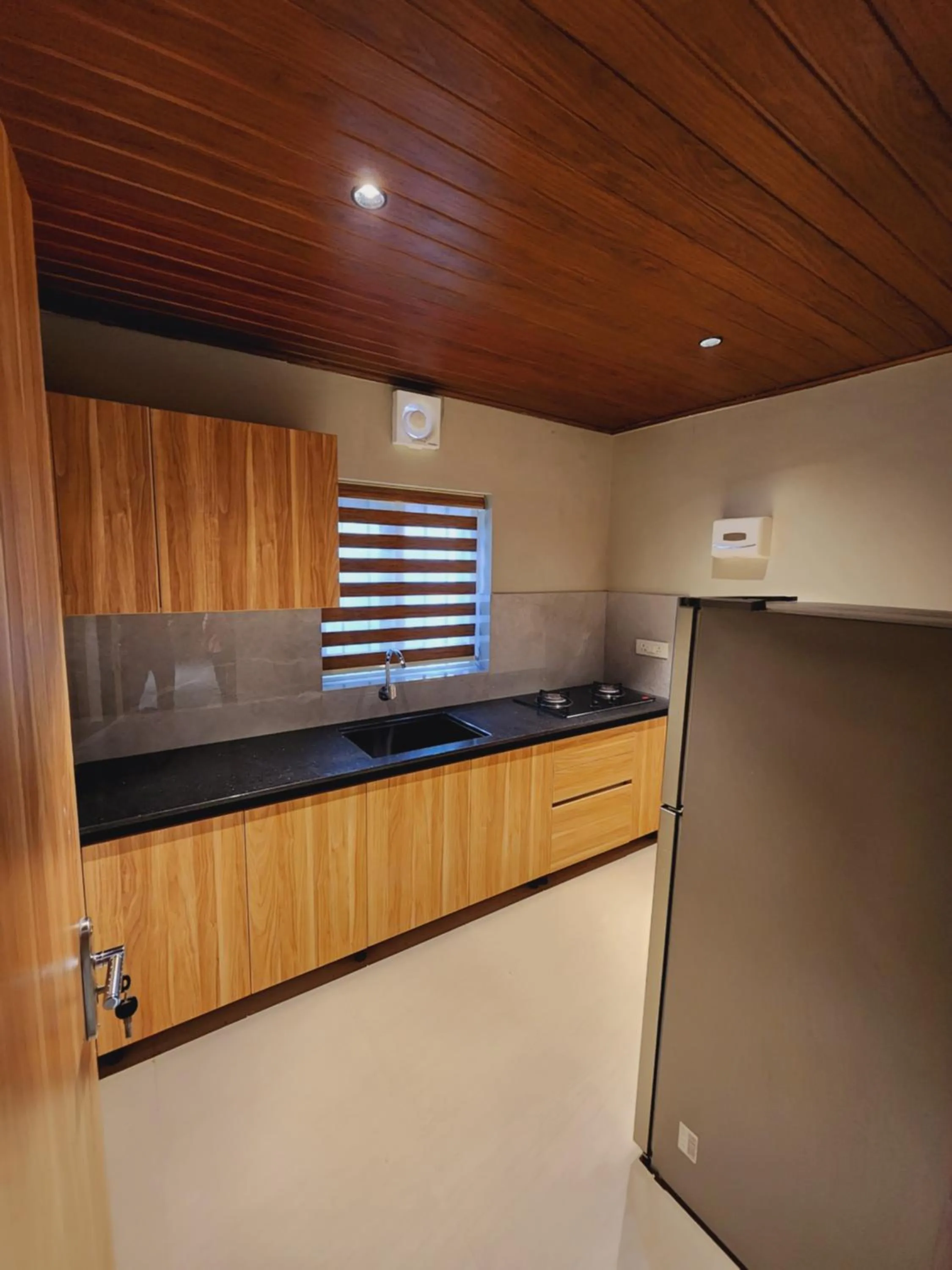 Kitchen or kitchenette in Muziris Manor Residency