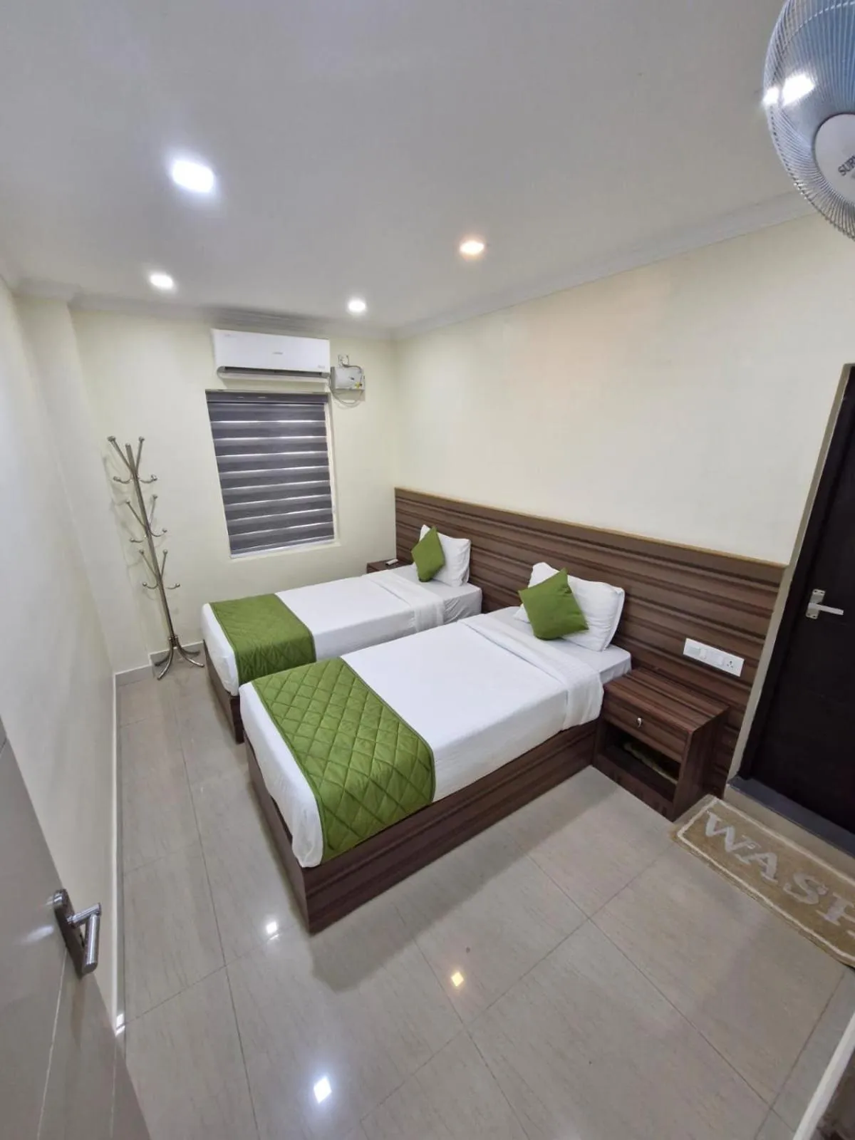 Bed in Muziris Manor Residency