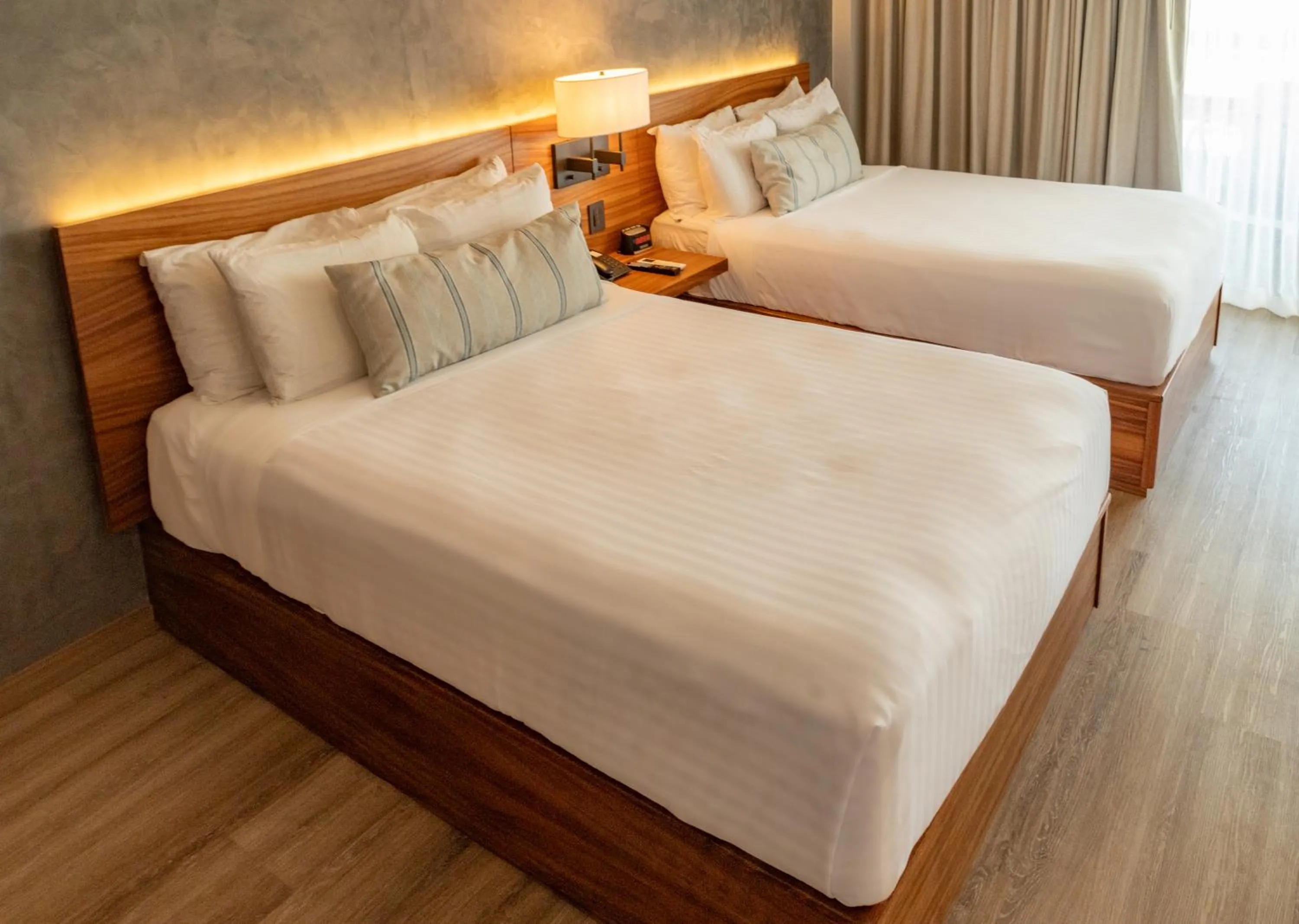 Photo of the whole room, Bed in Emporio Mazatlan