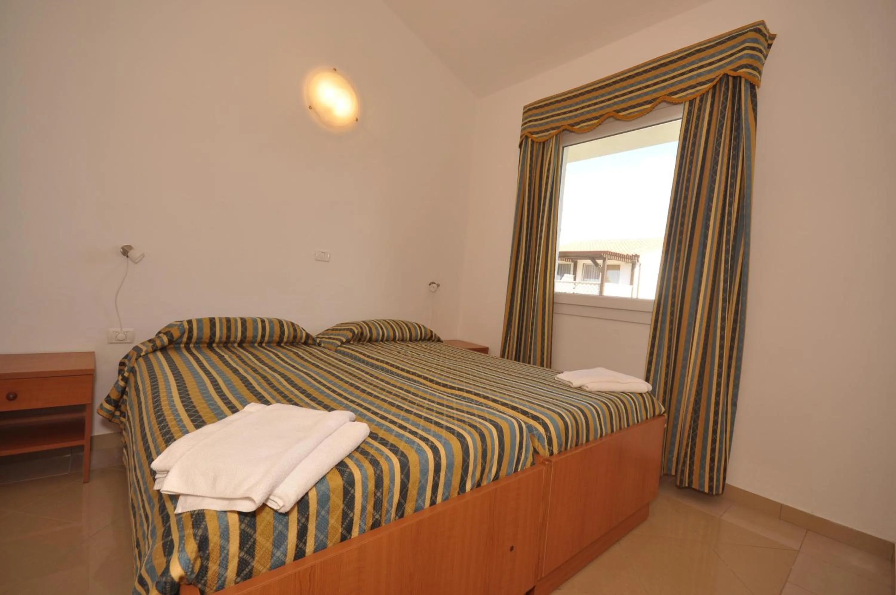 Photo of the whole room, Bed in Kazela Apartments