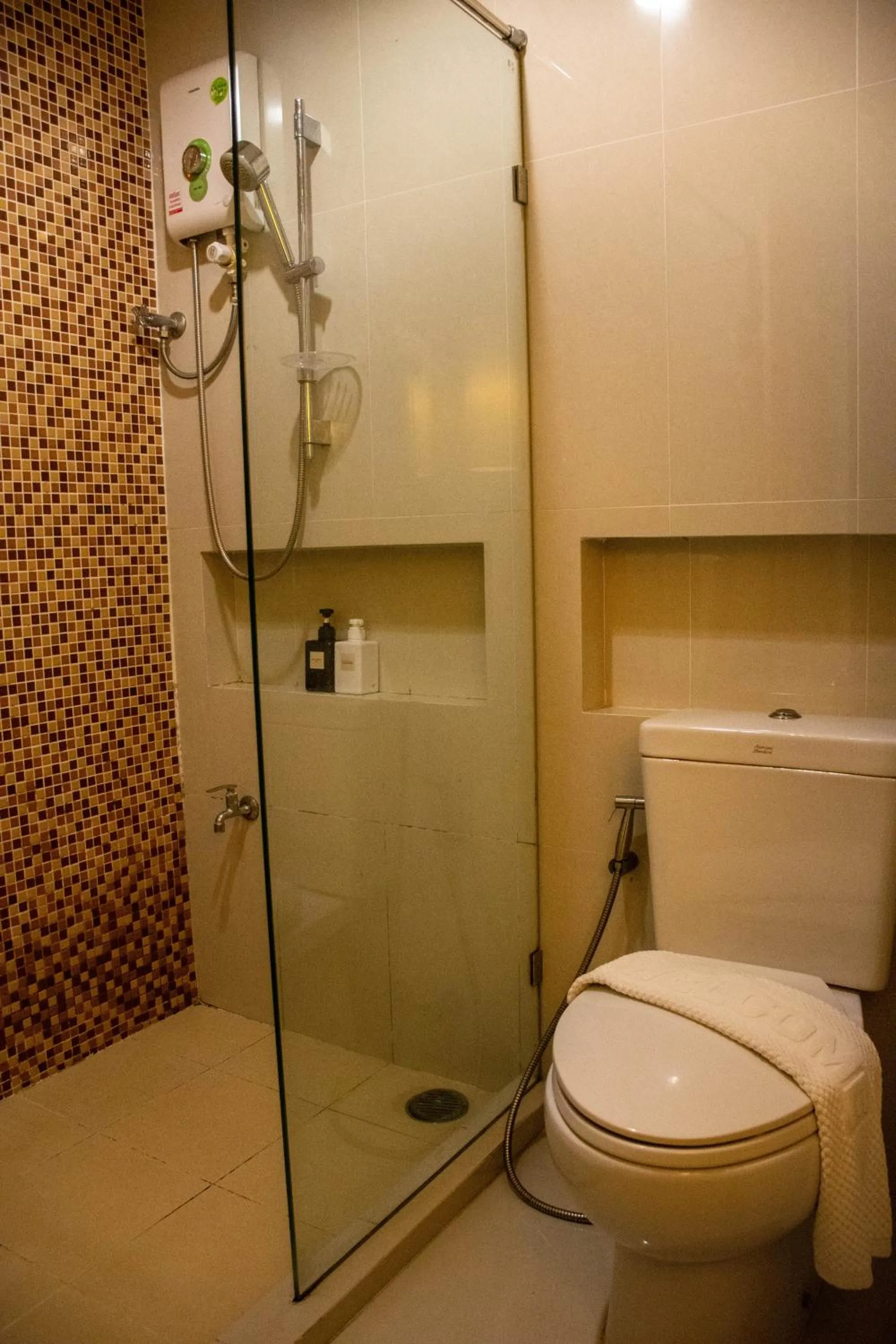 Shower in Chor Cher The Luxury Green Hotel - SHA Extra Plus