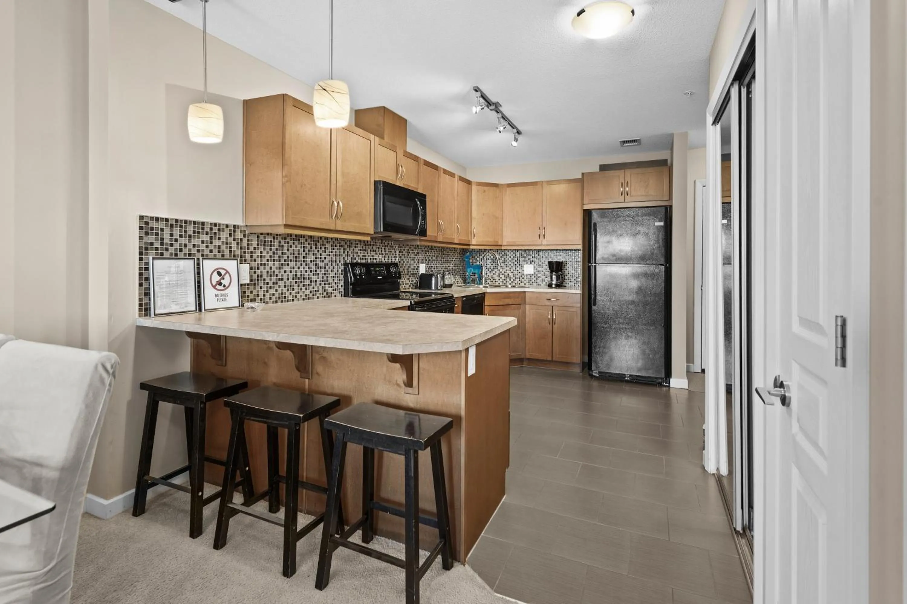 Kitchen or kitchenette in GlobalStay Downtown Calgary Condos