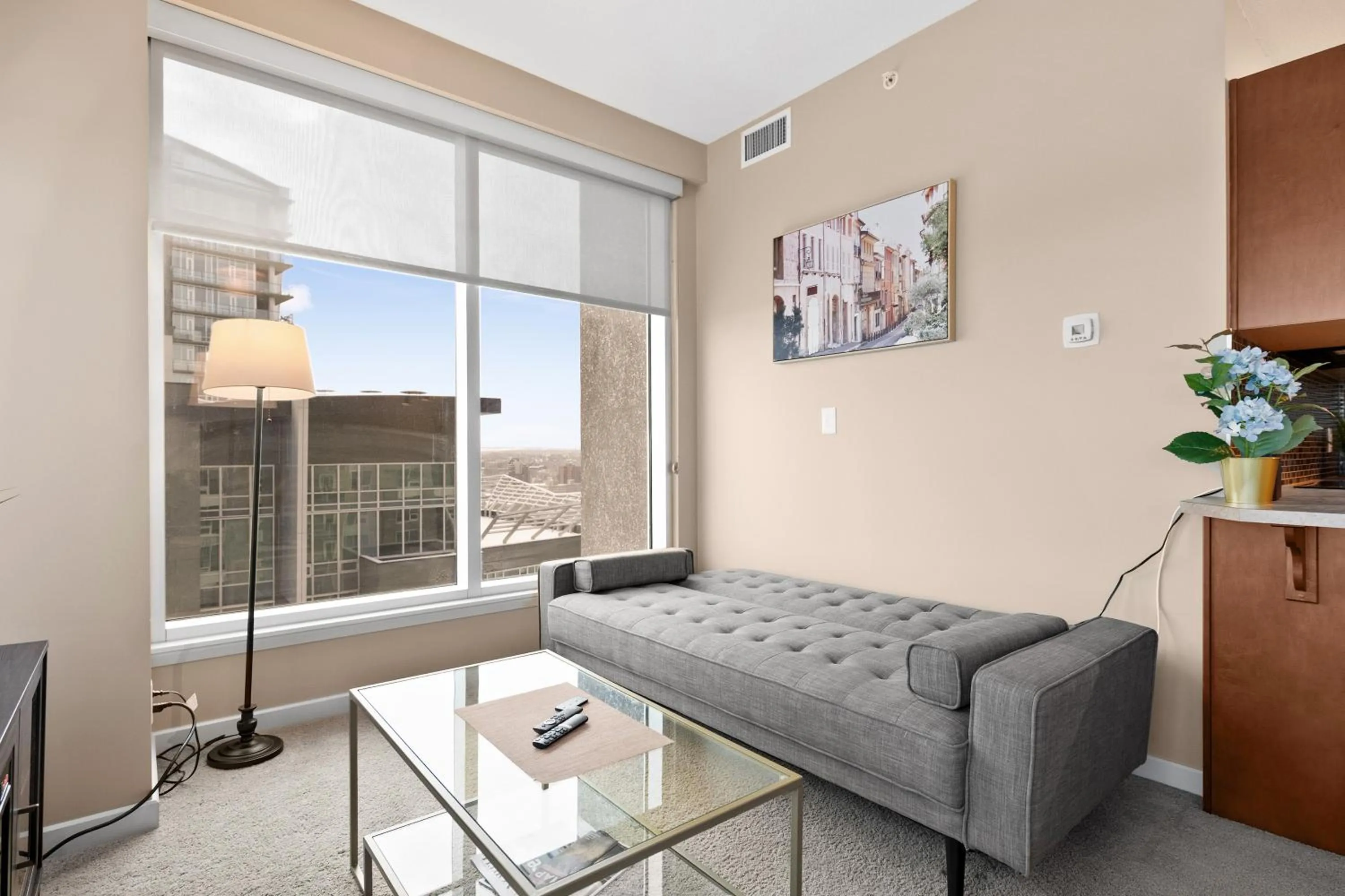 Living room in Stylish Downtown Condos by GLOBALSTAY